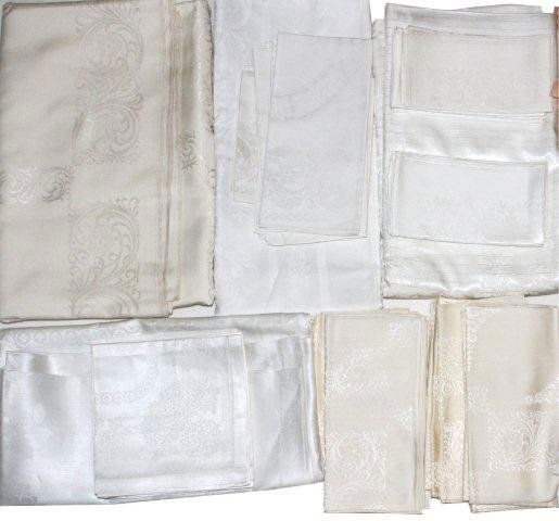 TABLECLOTHS: FOUR: TABLECLOTHS: FOUR:White linen tablecloth 72" x 70" with 6 napkins 11" x 11". Rayon tablecloth 96" x 68" with 12 napkins 21" x 21". White linen tablecloth 66" x 50" plus 6 napkins 16" x 16". White rayo