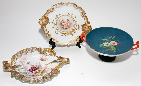 CONTINENTAL PORCELAIN PLATES, CHARGER & COMPOTE: CONTINENTAL PORCELAIN PLATES, CHARGER & COMPOTE, LATE 19TH C., FOUR PIECES, W 9 1/2"-11":Including 1 French decorated plate with scenes of cherubs, 1 German hand painted plate with floral sprays, 1 ch