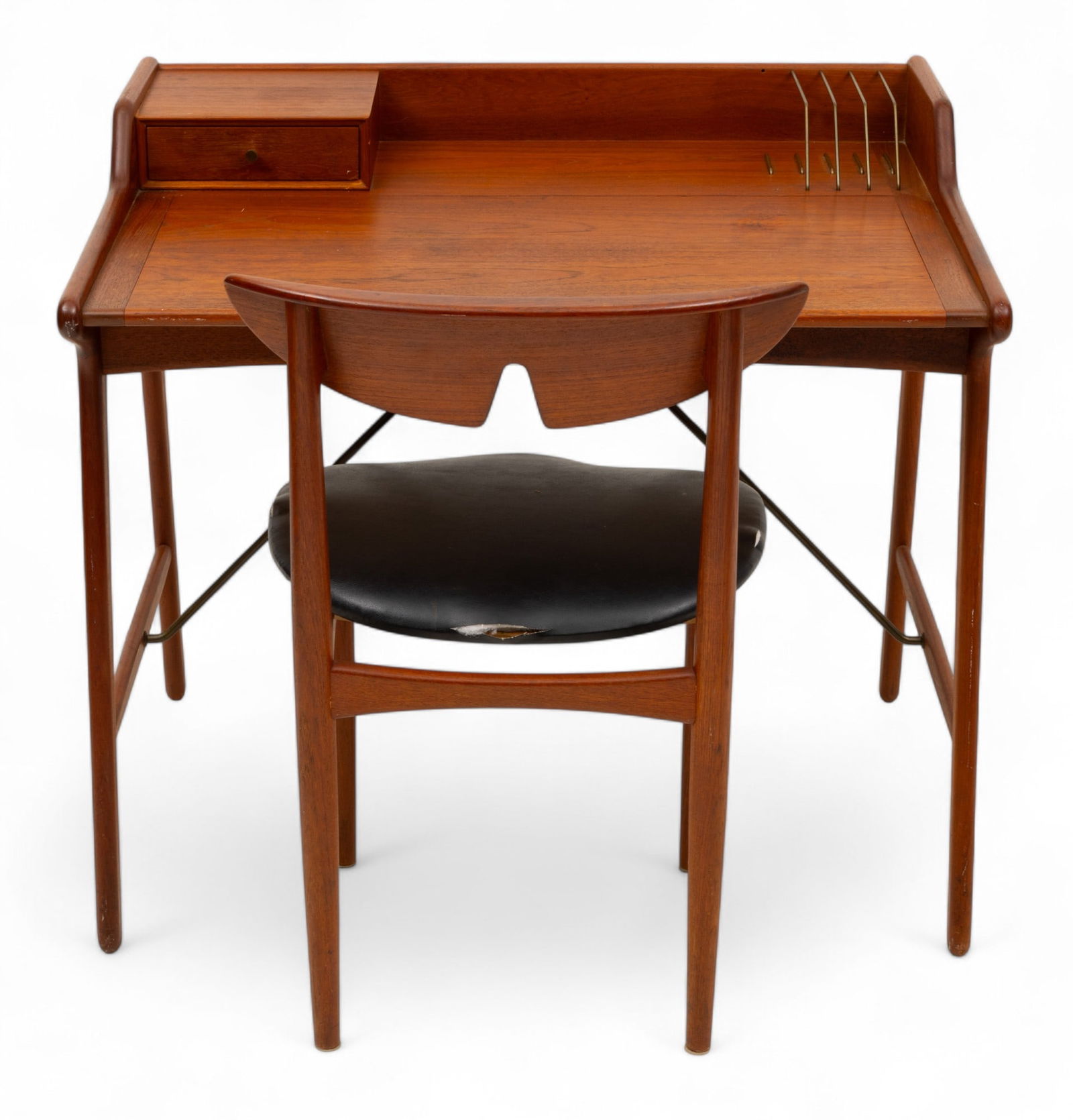 Svend Åge Madsen (Danish, 1928-1952), Ca. 1960, 'Teak Desk And Chair', H 36" W 35" Depth: Svend Åge Madsen (Danish, 1928-1952), Ca. 1960, 'Teak Desk And Chair', H 36" W 35" Depth 27" Partial stamp at bottom of desk. One small drawer. Brass letter rack. Metal stretcher bar. Side chair is 3