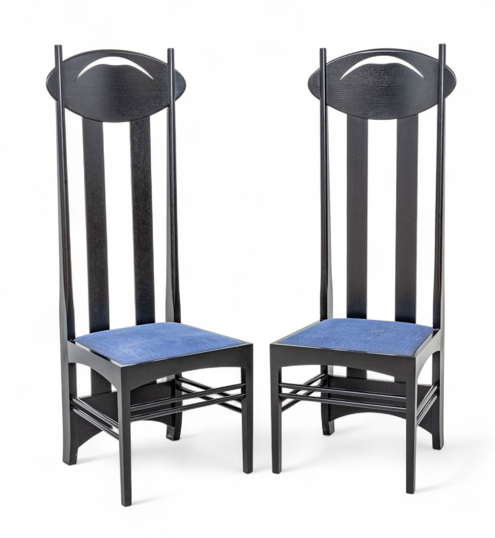 Charles Rennie Mackintosh (Scottish, 1868-1928) 'Argyle' Chairs by Cassina (Italy), 1973, H 54" W: Charles Rennie Mackintosh (Scottish, 1868-1928) 'Argyle' Chairs by Cassina (Italy), 1973, H 54" W 18.75" Depth 18" 2 PCS Ebonized ashwood frames with blue upholstered inset seats. Serial numbers 4930