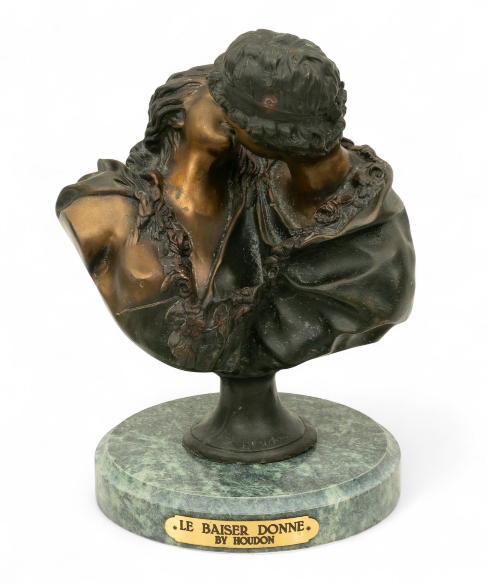 After J a Houdon Bronze Sculpture 'Le Baiser Donne or the Kiss Given', H 11": After J a Houdon Bronze Sculpture 'Le Baiser Donne or the Kiss Given', H 11" Mounted on green marble base. Dark brown patina. Dimensions: H 11"