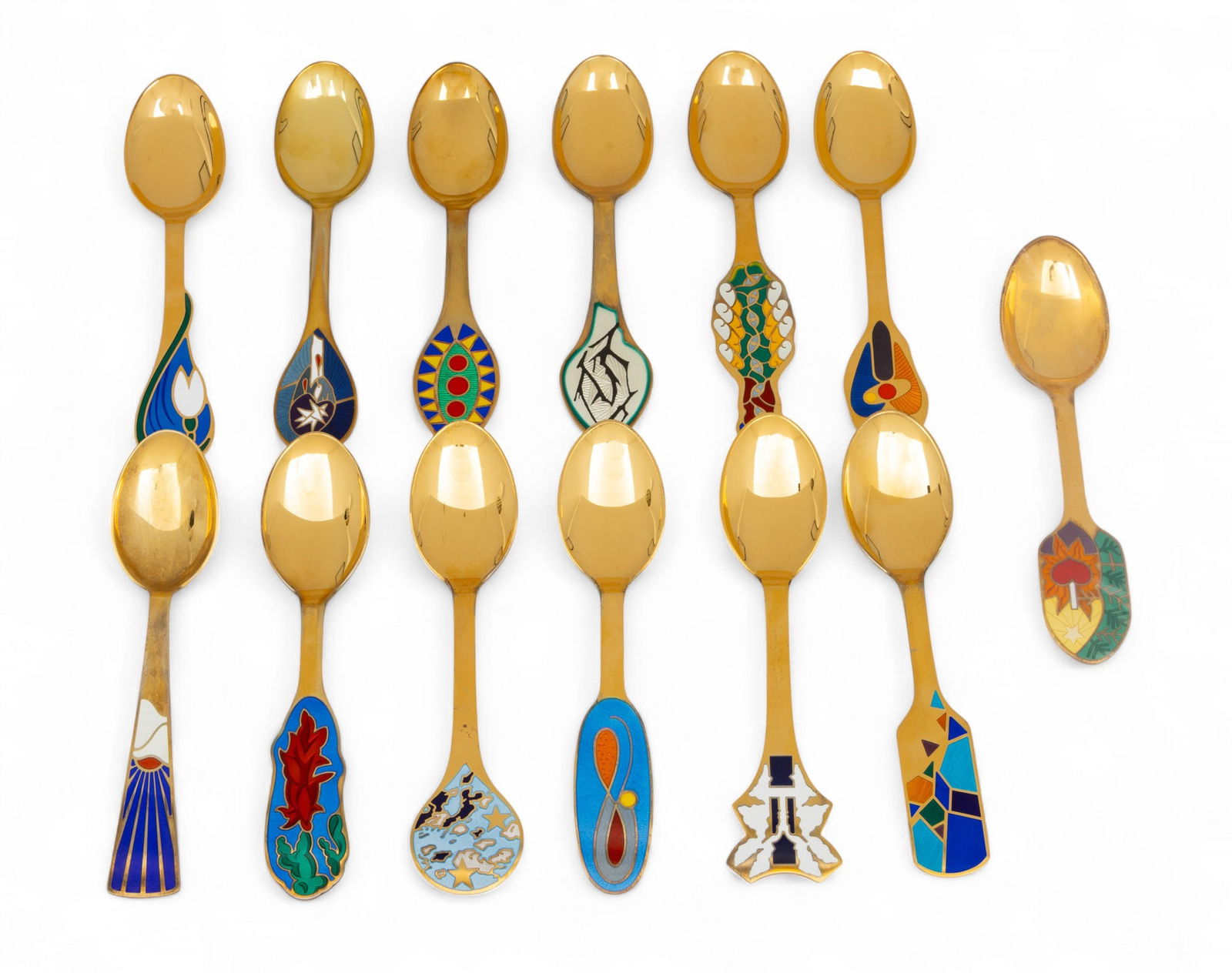 A. Michelsen (Danish) Gilded Sterling Silver And Enamel Christmas Spoons 1990 - 2002, L 6.5" 13 PCS: A. Michelsen (Danish) Gilded Sterling Silver And Enamel Christmas Spoons 1990 - 2002, L 6.5" 13 PCS Part of a series of collectable Christmas spoons produced annually by Danish company A. Michelsen. T