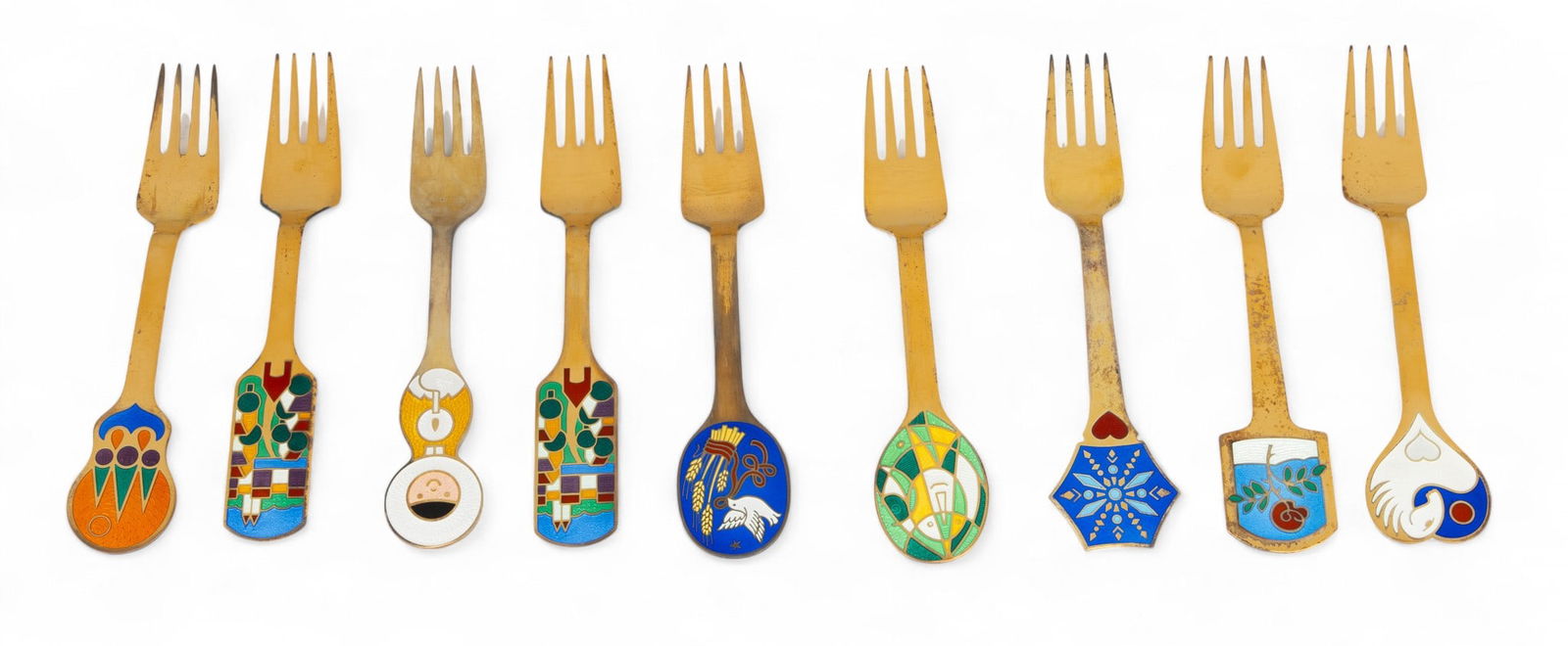 A. Michelsen (Danish) 1969 - 1988 Gilded Sterling Silver And Enamel Christmas Forks L 6.25" 9 PCS: A. Michelsen (Danish) 1969 - 1988 Gilded Sterling Silver And Enamel Christmas Forks L 6.25" 9 PCS Part of a series of collectable Christmas forks produced annually by Danish company A. Michelsen. This
