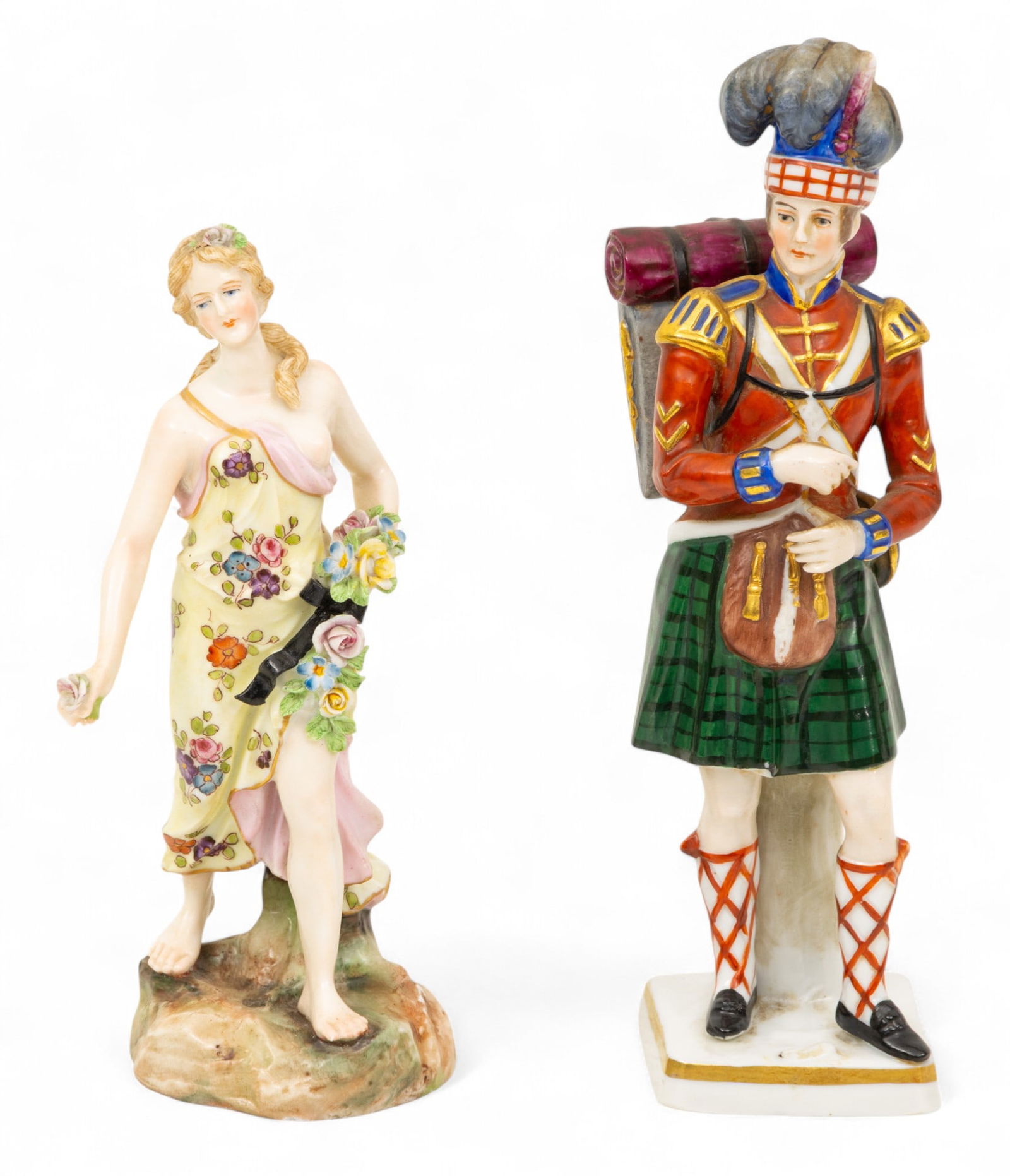 Capodimonte (Italian) Figurines 1900-1920, 2 PCS: Capodimonte (Italian) Figurines 1900-1920, 2 PCS Scottish soldier in kilt, uniform, and pack, marked verso "11th Highland Regiment 1808", H 8"; Classical maiden with spring flowers, H 6.25".&nbs