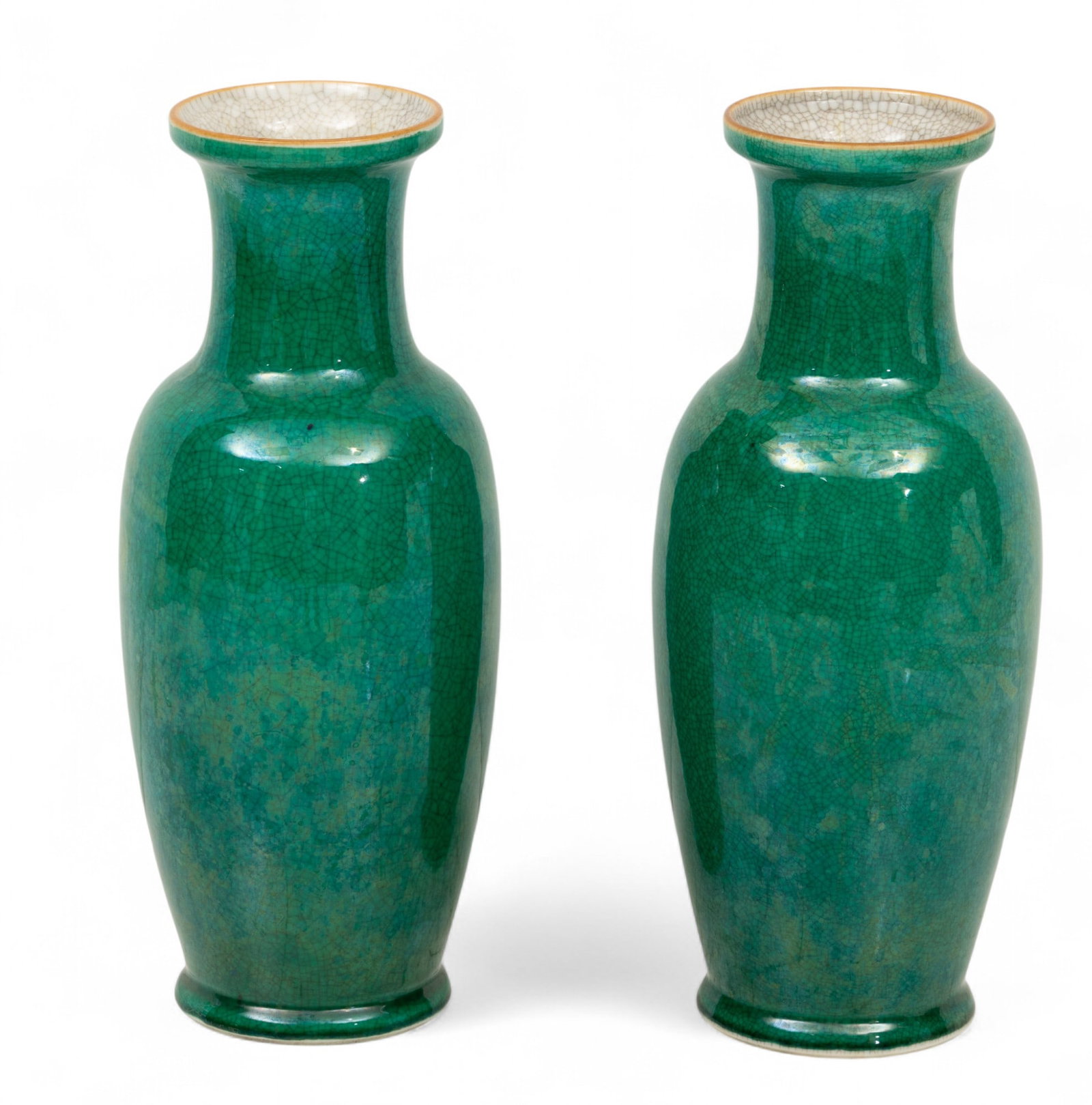 Chinese Porcelain Vases 20th C., H 12" Dia. 4.5": Chinese Porcelain Vases 20th C., H 12" Dia. 4.5" Green crackle glaze with oatmeal crackle glaze interior. Provenance: Property from the Estate Collection of Charles and Barbara Ghesquiere, Bloom