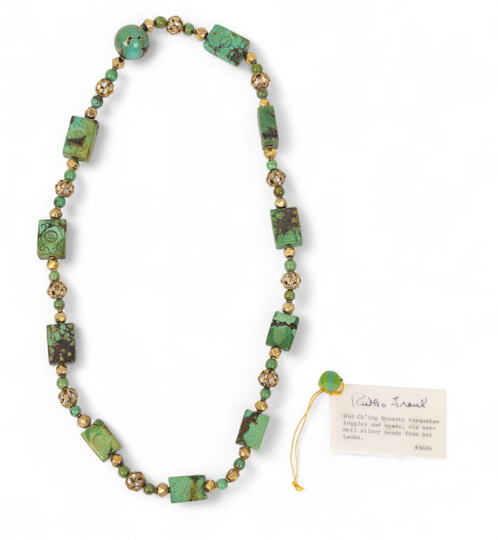Ruth Frank (American, 1921-2021) Turquoise Necklace L 28": Ruth Frank (American, 1921-2021) Turquoise Necklace L 28" Old Ch'ing Dynasty turquoise toggles and beads old vermeil silver beads. In Saks Fifth Avenue box. Provenance: Property from a Midland, 