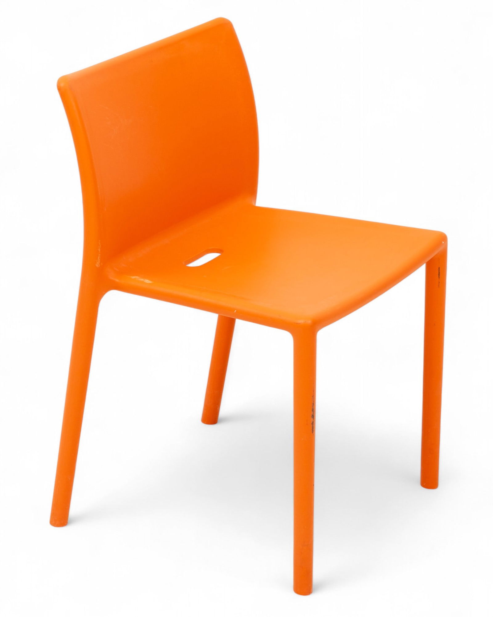 Jasper Morrison for Magis (English, B. 1955) Molded Polypropylene 20th Cen,, 'Air Chair', H 30" W: Jasper Morrison for Magis (English, B. 1955) Molded Polypropylene 20th Cen,, 'Air Chair', H 30" W 19" Depth 20" 1 PC Orange molded Polypropylene. Marked on underside "Air-Chair Design: Jasper Mor