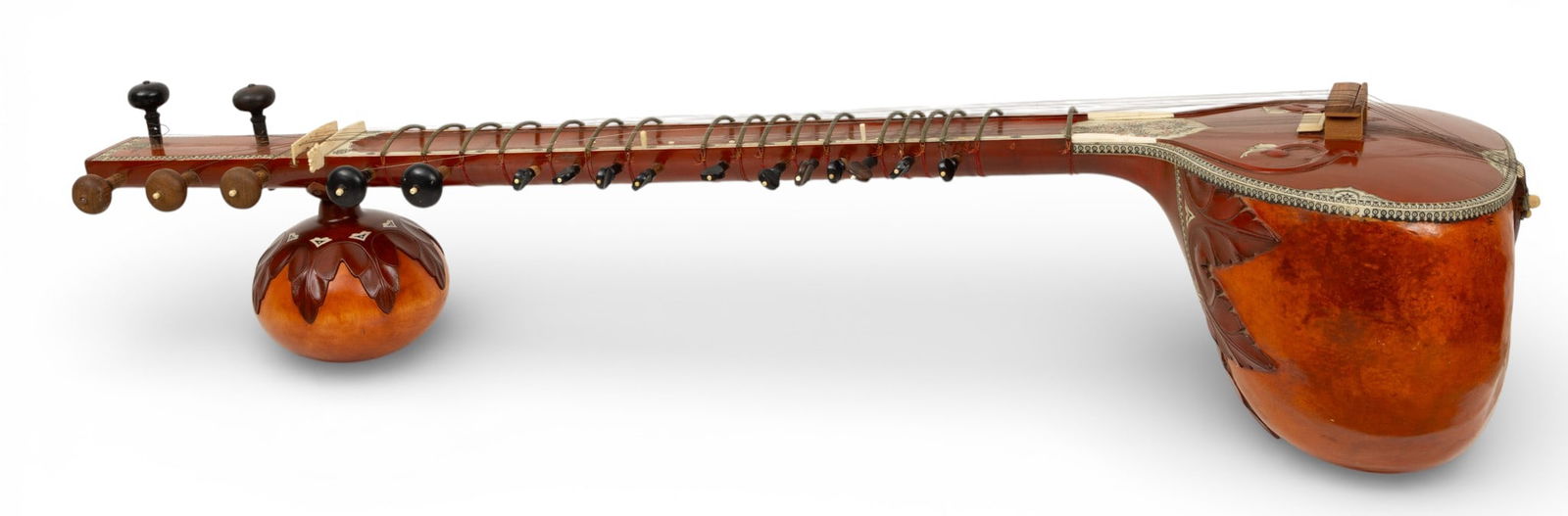 Bina (Indian) Inlaid Bone and Wood Sitar W 13" L 48": Bina (Indian) Inlaid Bone and Wood Sitar W 13" L 48" The base is made from a gourd, the neck is wood and it has bone inlay. Provenance: Property from a Bloomfield Township, MI private collection. Dim