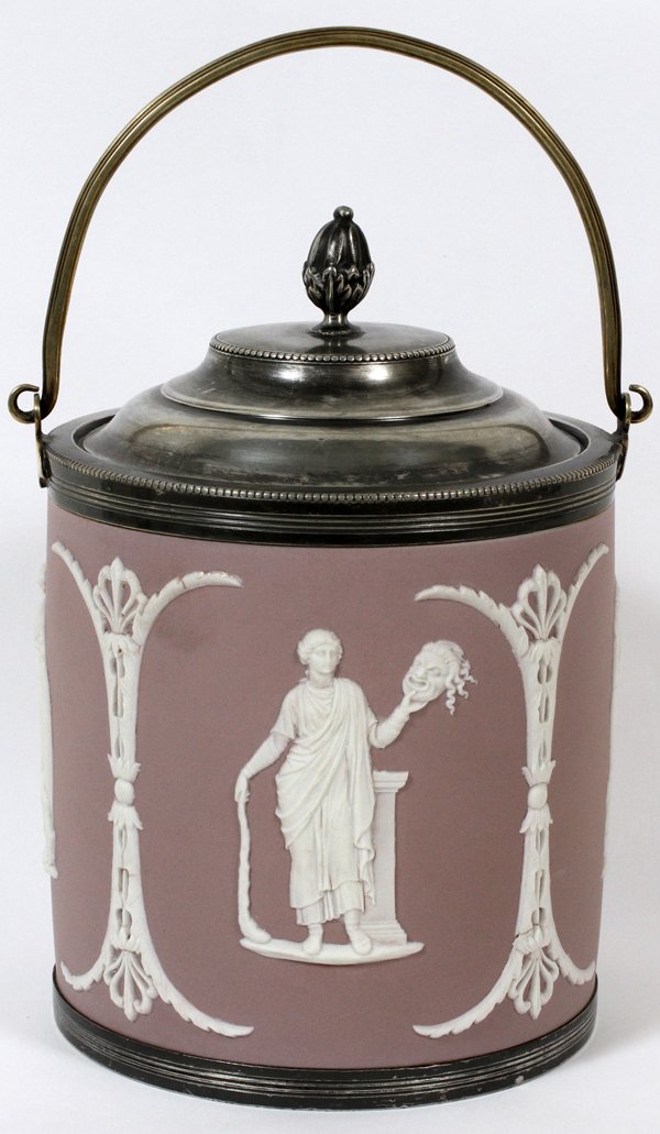 WEDGWOOD LILAC JASPERWARE PEWTER BISCUIT BARREL: WEDGWOOD LILAC JASPERWARE & PEWTER BISCUIT BARREL, H 8": lavender and white porcelain biscuit barrel with classical muse design with pewter lid, rim and wire handle. Wedgwood mark on the undersi