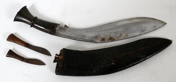 NEPALESE KUKRI KNIFE, 20TH C., L 11" BLADE: NEPALESE KUKRI KNIFE, 20TH C., L 11" BLADE:traditional Kukri knife with a polished steel blade, 11" L., bone handle; also includes the additional small utility knives 'Chakmak' for honing the Kukri bl