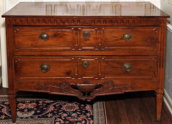 FRENCH CARVED WALNUT TWO-DRAWER CHEST, ANTIQUE: FRENCH CARVED WALNUT TWO-DRAWER CHEST, ANTIQUE, H 35 1/2", W 48", D 25":Fitted with two drawers, an urn flanked by floral sprigs carved at the apron. From the Estate of Walter Connolly, Grosse Pointe