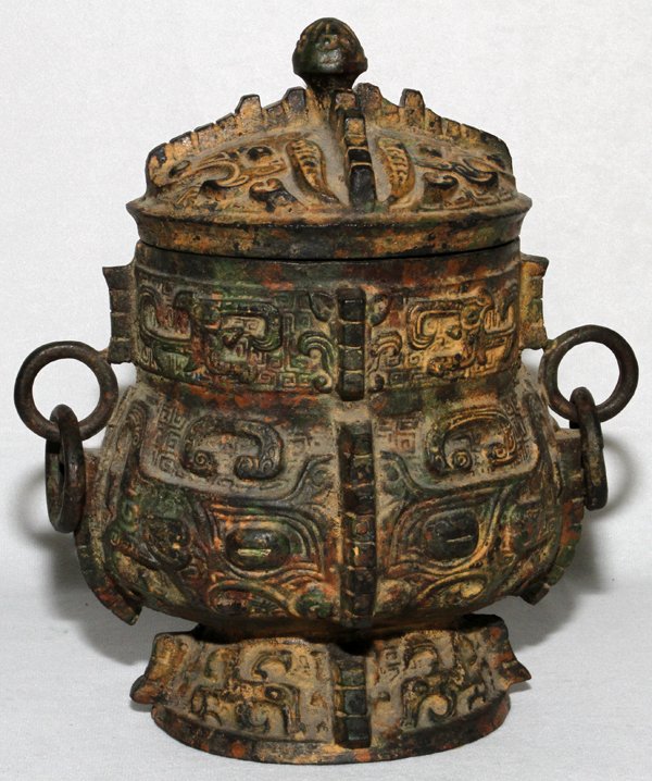 CHINESE IRON COVERED VESSEL, H 9", W 8": CHINESE IRON COVERED VESSEL, H 9", W 8":Double ring handles. From the Collection of John P. O'Hara, Bloomfield Hills, Mich.