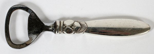 GEORG JENSEN 'CACTUS' STERLING BOTTLE OPENER: GEORG JENSEN 'CACTUS' STERLING BOTTLE OPENER, L 4 3/4":The sterling silver handle is stamped "GI" in a beaded oval and "Sterling Denmark". From the Estate of Walter Connolly, Grosse Pointe Farms, Mi.