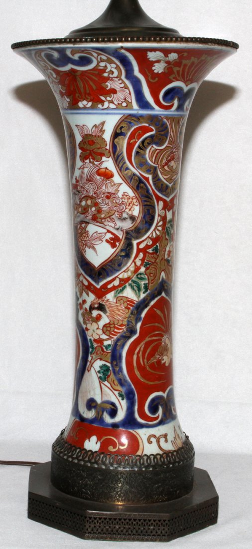 JAPANESE IMARI PORCELAIN VASE AS A LAMP, H 33": JAPANESE IMARI PORCELAIN VASE, H 15", MOUNTED AS A LAMP, H 33" OVERALL:White ground with blue and rust decoration. From the Collection of John P. O'Hara, Bloomfield Hills, Mich.