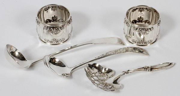 GEORGIAN & AMERICAN STERLING LADLES SPOON RINGS: GEORGIAN & AMERICAN STERLING SAUCE LADLES, NUT SPOON, & NAPKIN RINGS, FIVE PIECES:Including 1 Georgian sauce ladle, Edinburgh, 1809-10, L.6 1/4"; 1 S. Kirk & Son sauce ladle, L.5 1/2"; 1 Whiting Divis