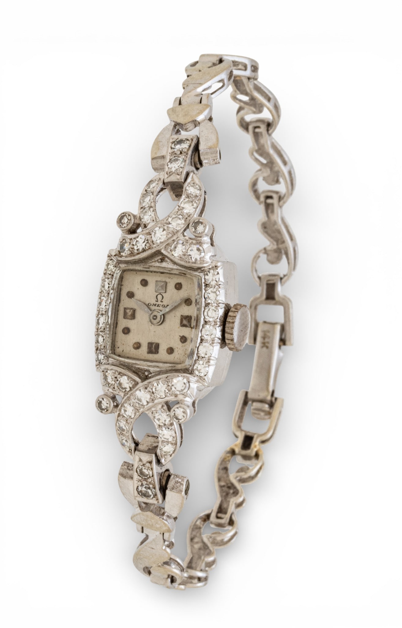 Omega (Swiss Geneva) 14k White Gold and Diamond Wrist Watch L 6" 18 g: Omega (Swiss Geneva) 14k White Gold and Diamond Wrist Watch L 6" 18 g 14k white gold ladies Omega link watch with diamond melee. Monogramed on the back of the case "MRD." Dimensions: L 6" 18 g