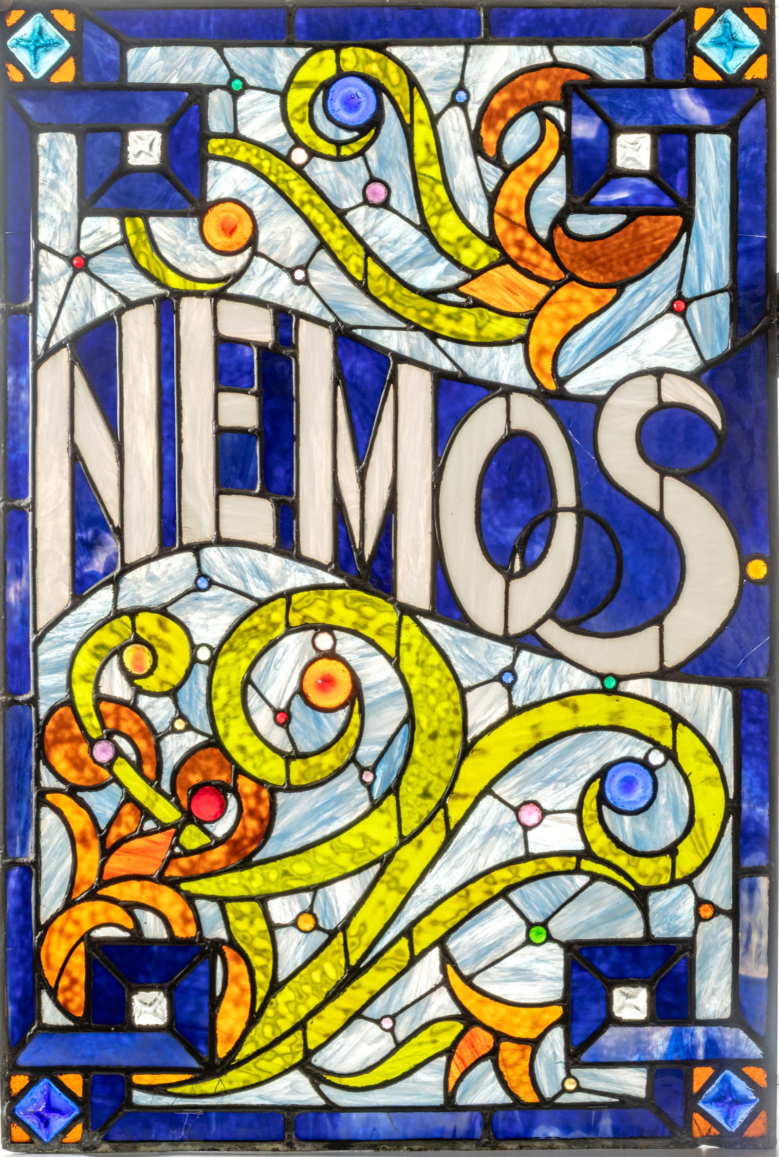 Leaded Art Glass Window from Nemo's Pub, Detroit, MI. 1960/70, H 44" W 30": Leaded Art Glass Window from Nemo's Pub, Detroit, MI. 1960/70, H 44" W 30" Leaded slag and art glass with jeweled accents. From Nemo's Pub, 1384 Michigan Ave, Detroit, MI. Provenance: Purc