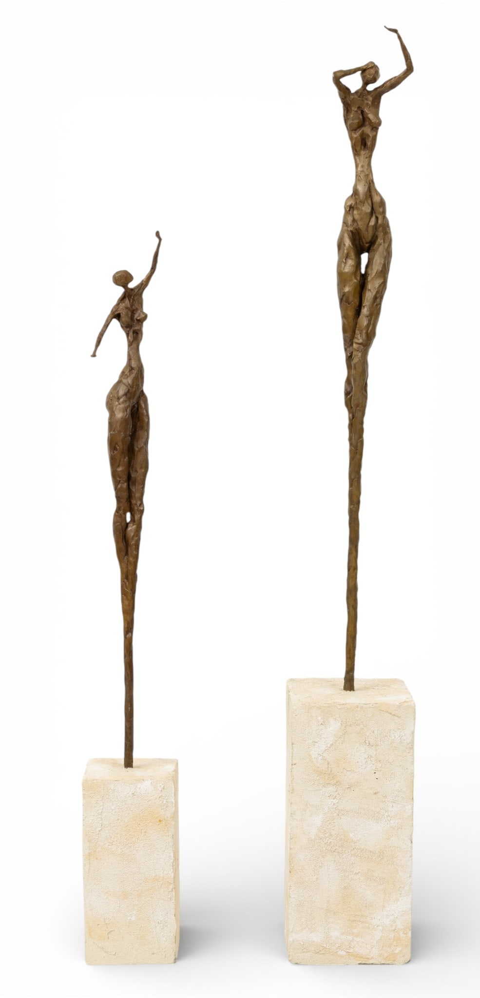 Huda Pair of Bronze Standing Nude Female Sculptures H 42.255" 1 PAIR: Huda Pair of Bronze Standing Nude Female Sculptures H 42.255" 1 PAIR In the style of Alberto Giacometti (1901 - 1966). Both resting on concrete bases. Smaller sculpture signed Huda, 13/40. H 33" W 4"