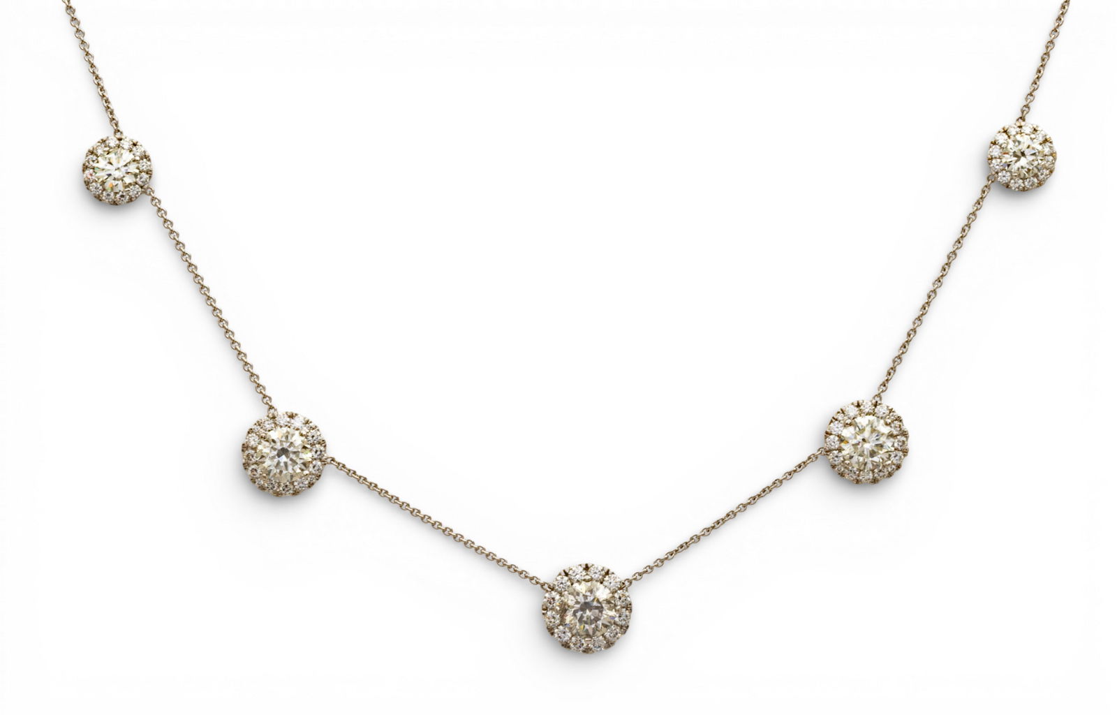 Italian Ladies 18k White Gold and Diamond Multiple Halo Necklace L 16": Italian Ladies 18k White Gold and Diamond Multiple Halo Necklace L 16" A ladies' diamond multiple halo necklace consisting of five 18k white gold custom halo design pendant mountings having 68 round b