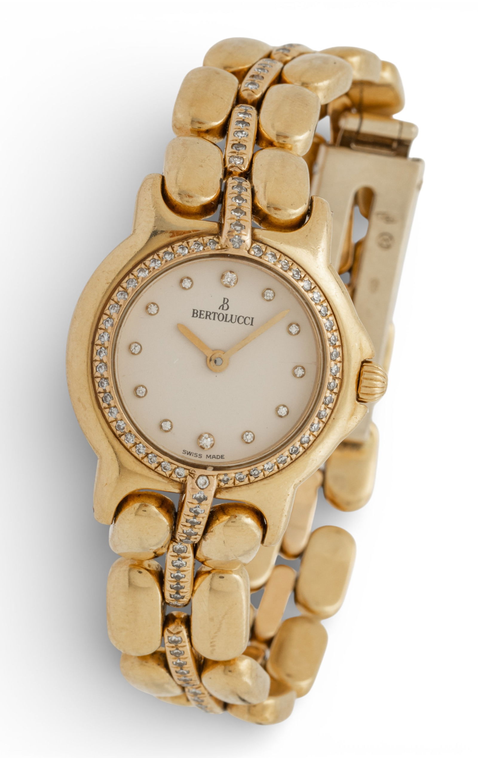 Bertolucci (Swiss) 18k Yellow Gold and Diamond Women's Watch 'Pulchra', L 7" 91 g 1 PC: Bertolucci (Swiss) 18k Yellow Gold and Diamond Women's Watch 'Pulchra', L 7" 91 g 1 PC An 18k yellow gold and melee diamond women's link watch by Bertolucci having a fold-over hidden clasp. Marked Pul