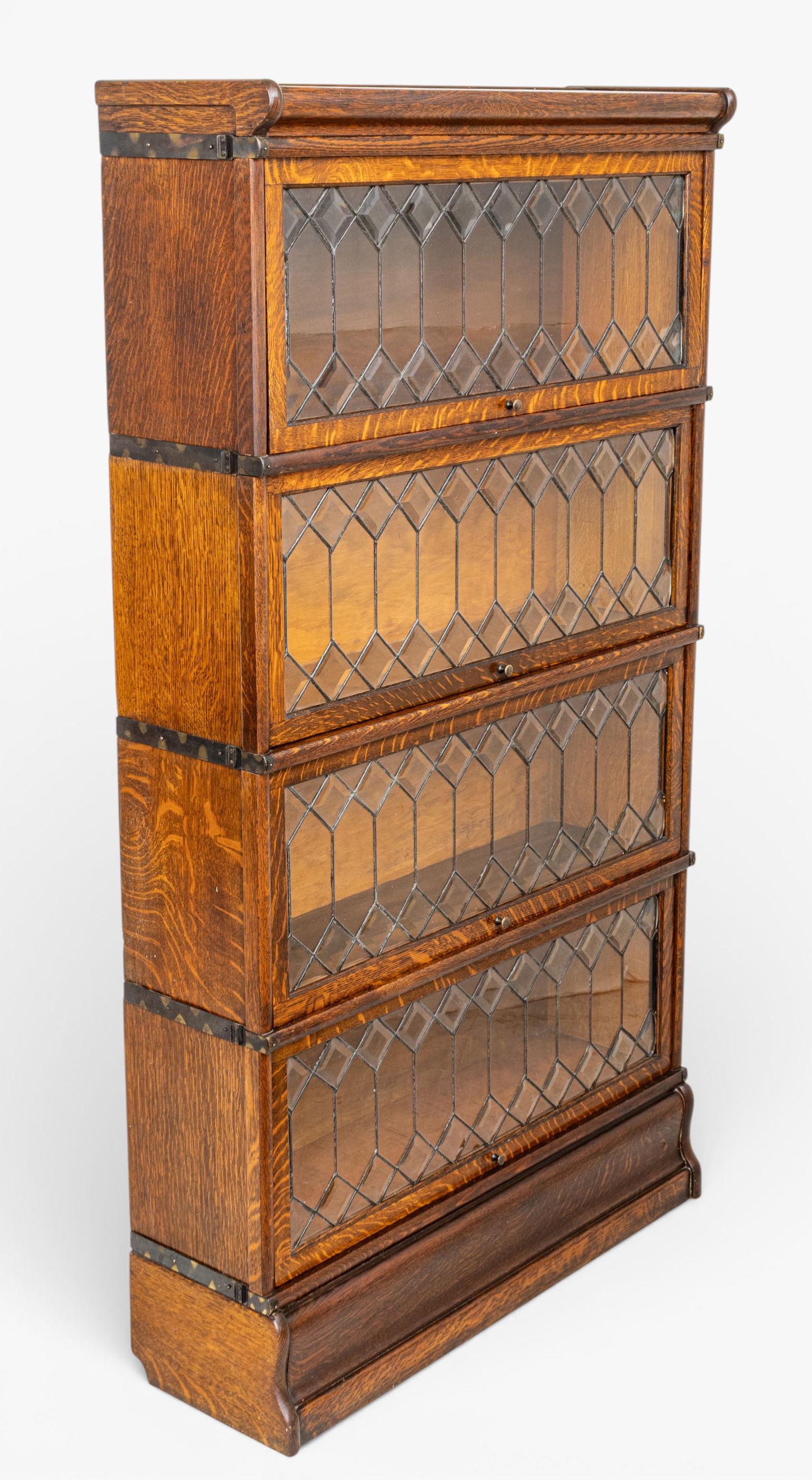 The Globe-Wernicke Co. (Cincinnati, OH) Oak Four Stack Barrister Bookcase, Early 20th C., H 62" W: The Globe-Wernicke Co. (Cincinnati, OH) Oak Four Stack Barrister Bookcase, Early 20th C., H 62" W 34" Depth 11" Four stackable shelves with hinged sliding doors with leaded glass panel fronts. Each un