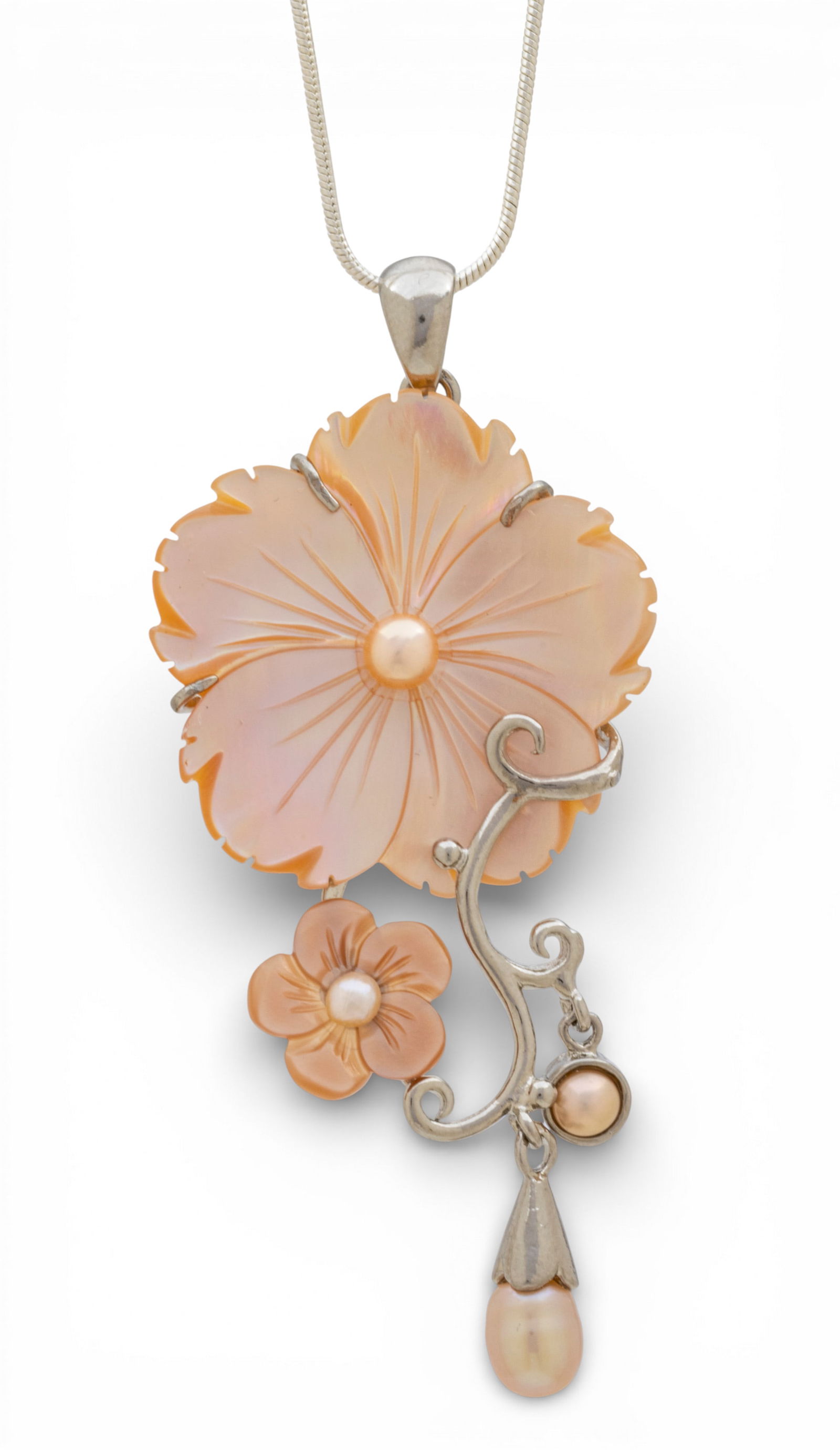 Sterling Silver, Mother of Pearl, and Pearl Flower Pendant Necklace H 3" L 22" 14.4 g: Sterling Silver, Mother of Pearl, and Pearl Flower Pendant Necklace H 3" L 22" 14.4 g A mother of pearl and pearl flower pendant on a sterling silver snake chain having a lobster clasp. Stamped 925 to