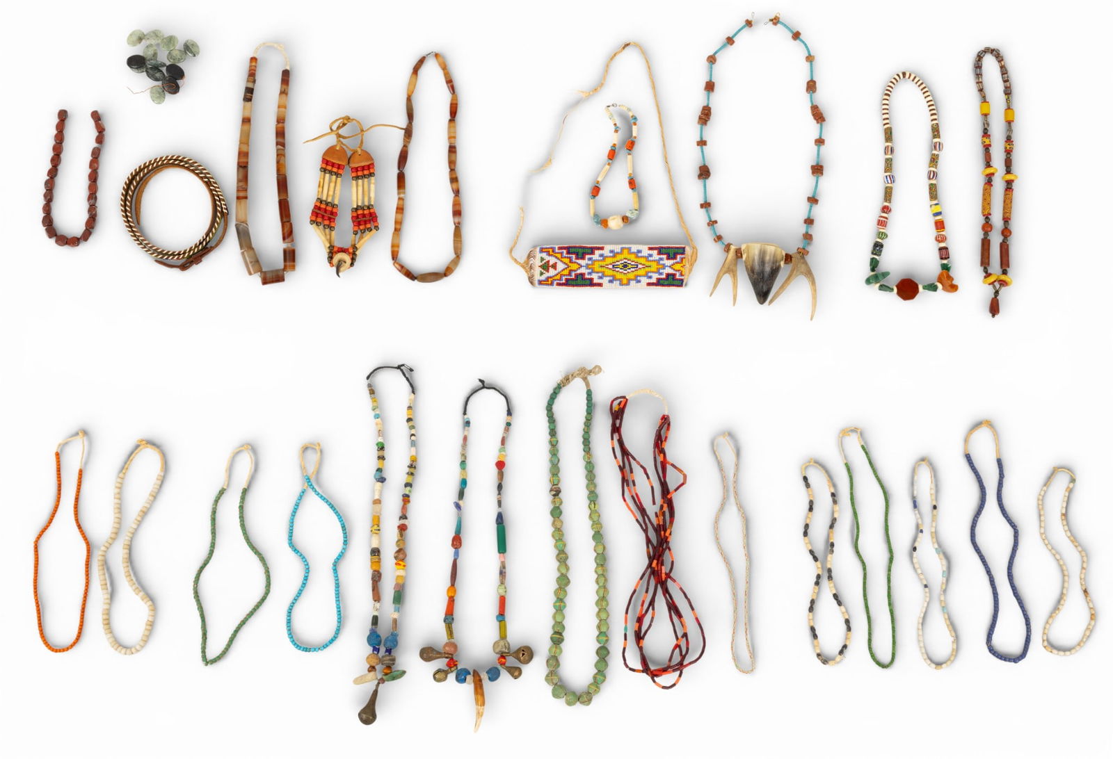 Assorted Trade Bead Necklaces, Belt, and Beads 28 PCS: Assorted Trade Bead Necklaces, Belt, and Beads 28 PCS African trade bead necklaces grouping with one belt, one strand of beads, and a bag of loose beads. One bead necklace with antlers and horn (26"),