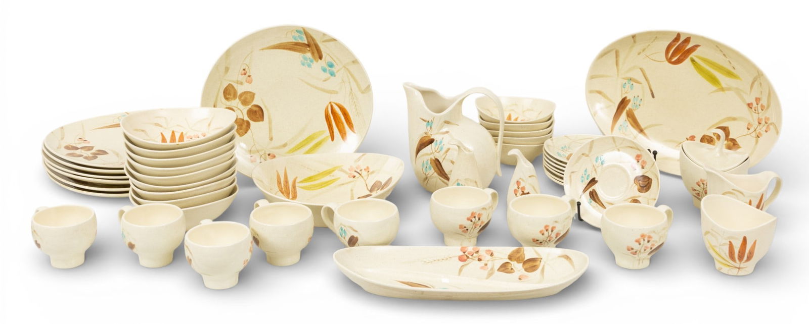 Red Wing Pottery 1955, 'Random Harvest', 82 PCS: Red Wing Pottery 1955, 'Random Harvest', 82 PCS Hand painted with autumn foliage. Includes: 1) 8 teacups and saucers. 2) 1 large bowl. 3) 1 pitcher. 4) 3 gravy boats. 5) 16 small plates. 6) 14 large p