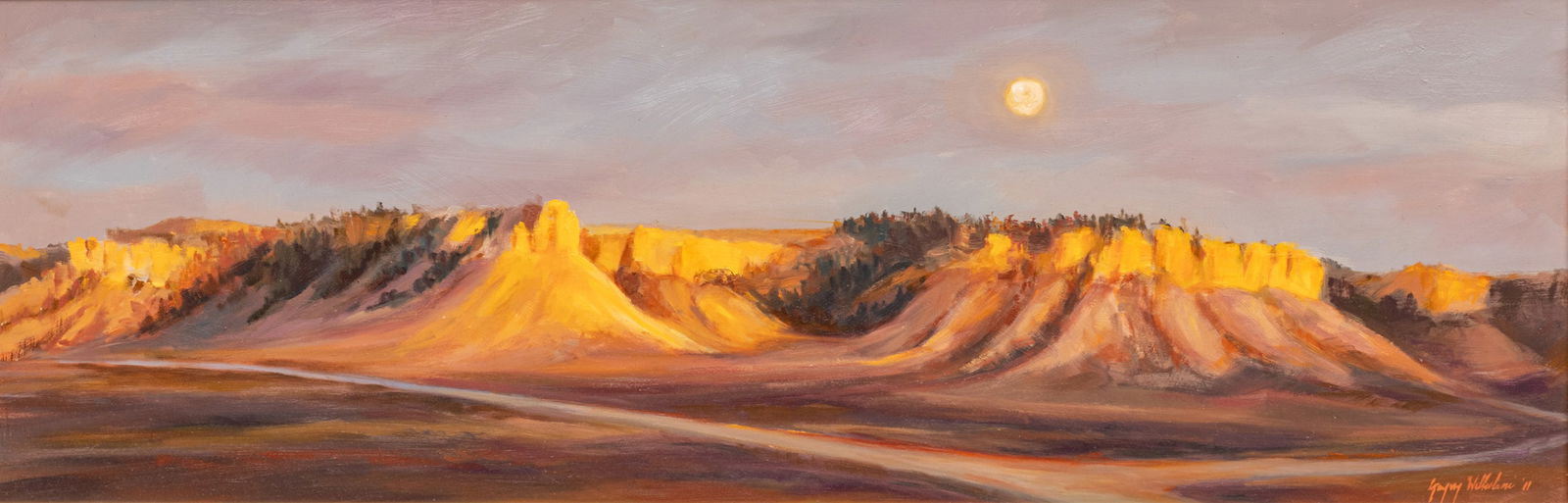 Gregory Wilhelmi (American, B. 1943) Oil on Panel, 2011, 'Western Mountainscape', H 12" W 36" Frame: Gregory Wilhelmi (American, B. 1943) Oil on Panel, 2011, 'Western Mountainscape', H 12" W 36" Frame Size: H 18.5" W 42.75" Signed and dated lower right. Panoramic twilight view of a mountain range in