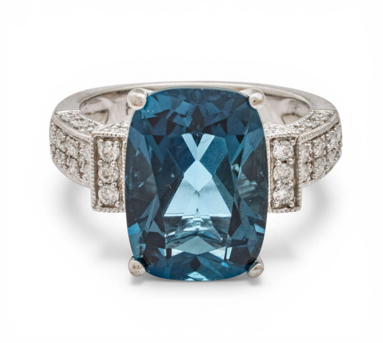 8.5 Carat London Blue Topaz, Diamond, and 14k White Gold Ring Size 5.5 6 g: 8.5 Carat London Blue Topaz, Diamond, and 14k White Gold Ring Size 5.5 6 g A ladies' London blue topaz and diamond ring consisting of one 14k white gold setting, one cushion cut London blue topaz (13.