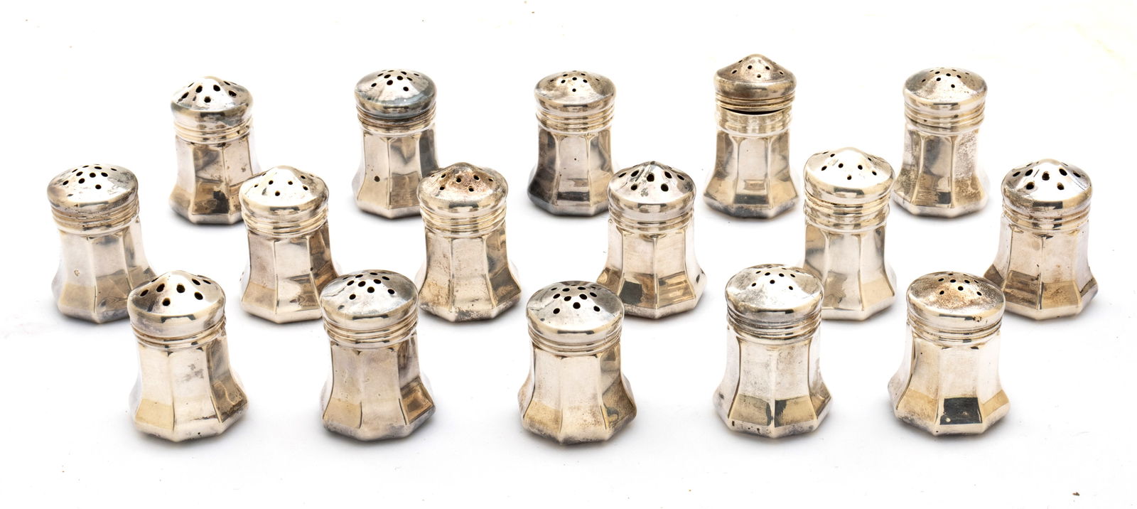 Cartier (French) Sterling Silver Individual Salt and Pepper Shakers in Original Boxes H 1.5" Dia. 1": Cartier (French) Sterling Silver Individual Salt and Pepper Shakers in Original Boxes H 1.5" Dia. 1" 4 t oz 16 PCS Two sets of eight individual shakers in two original Cartier fitted boxes, 9.5" X 2"