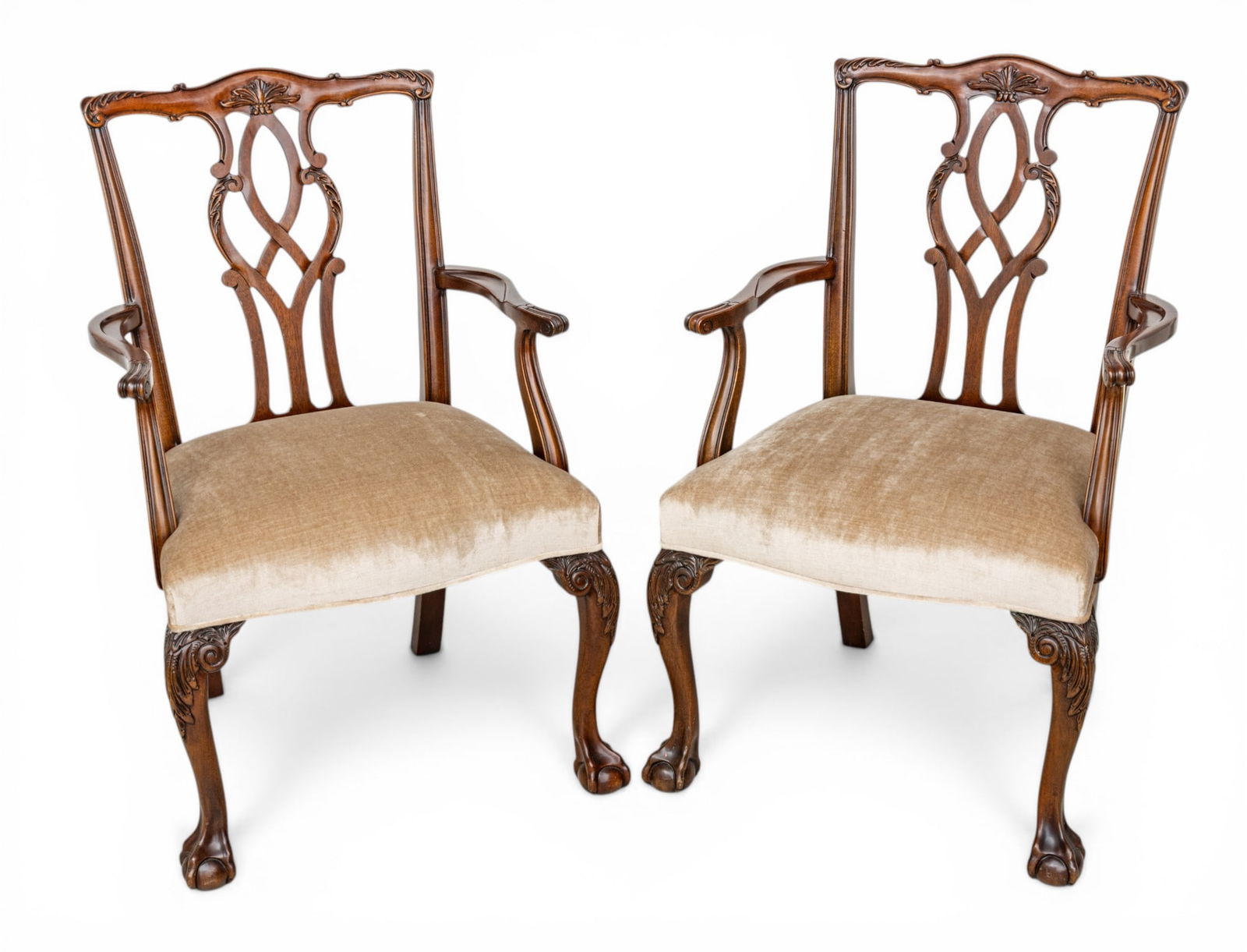 Chippendale Style Mahogany Dining Arm Chairs 20th C., H 38" W 24" Depth 19.5" 1 PAIR: Chippendale Style Mahogany Dining Arm Chairs 20th C., H 38" W 24" Depth 19.5" 1 PAIR Upholstered seats, carved and pierced back splats, raised on cabriole legs terminating in ball-and-claw feet. Dimen