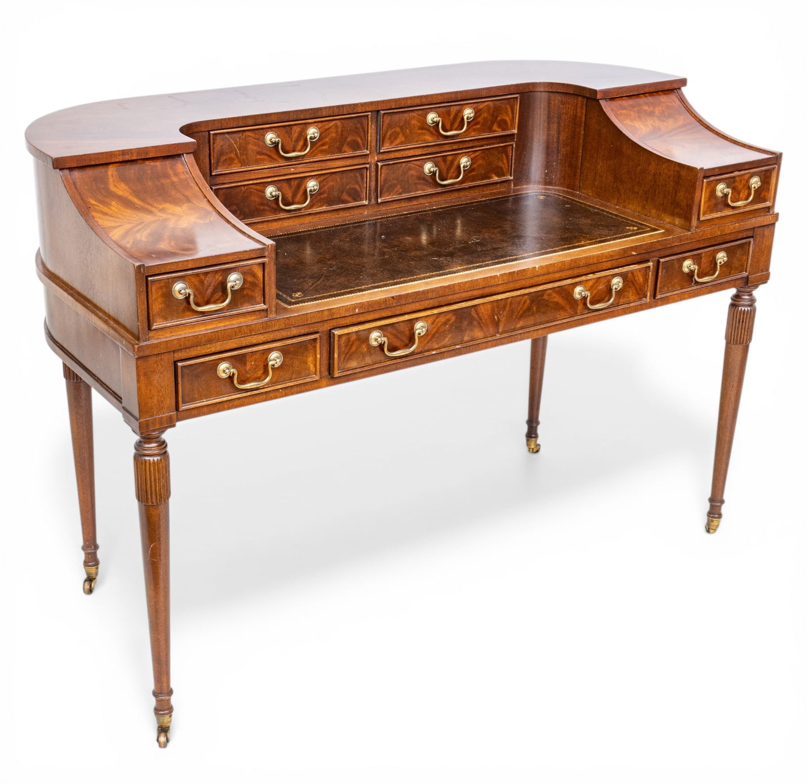 Sligh Furniture Co. (Holland, Michigan) Mahogany Carlton House Desk, Ca. 1980, H 37.25" W 53.75": Sligh Furniture Co. (Holland, Michigan) Mahogany Carlton House Desk, Ca. 1980, H 37.25" W 53.75" Depth 26" Raised back U-shaped with sloping sides and six upper small drawers around a gilt tooled leat