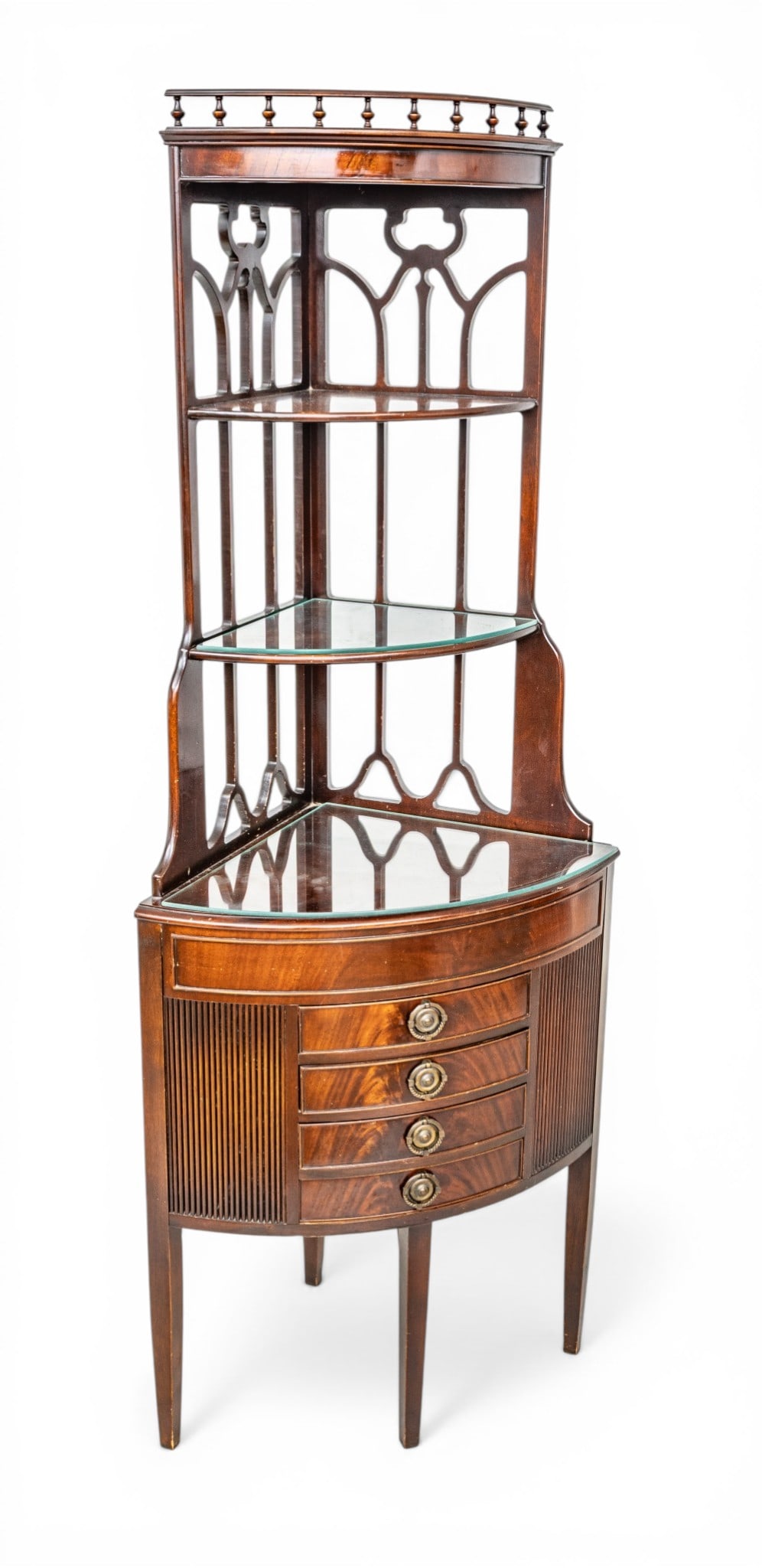 Four-Tier Mahogany Corner Cabinet, Ca. 1950, H 35.5" W 25.25" Depth 18": Four-Tier Mahogany Corner Cabinet, Ca. 1950, H 35.5" W 25.25" Depth 18" Bowed corner cabinet with four drawers flanked by reeded sides, raised on straight tapering legs. Provenance: Property from Fra