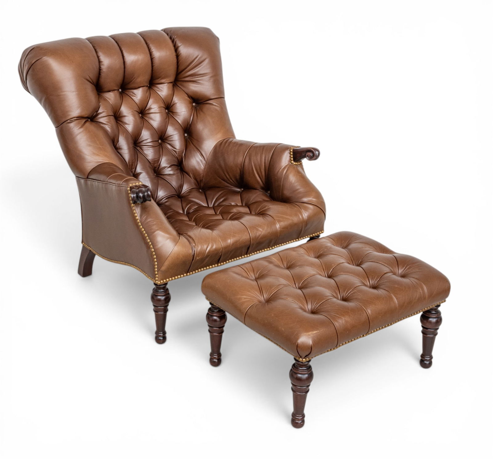 Stickley (American) Leather Tufted Club Chair and Ottoman 20th C., 2 PCS: Stickley (American) Leather Tufted Club Chair and Ottoman 20th C., 2 PCS Leather tufted club chair and ottoman with brass nail head trim. Dimensions: seat height 12" Arm height 21". Stickley, Highpoin