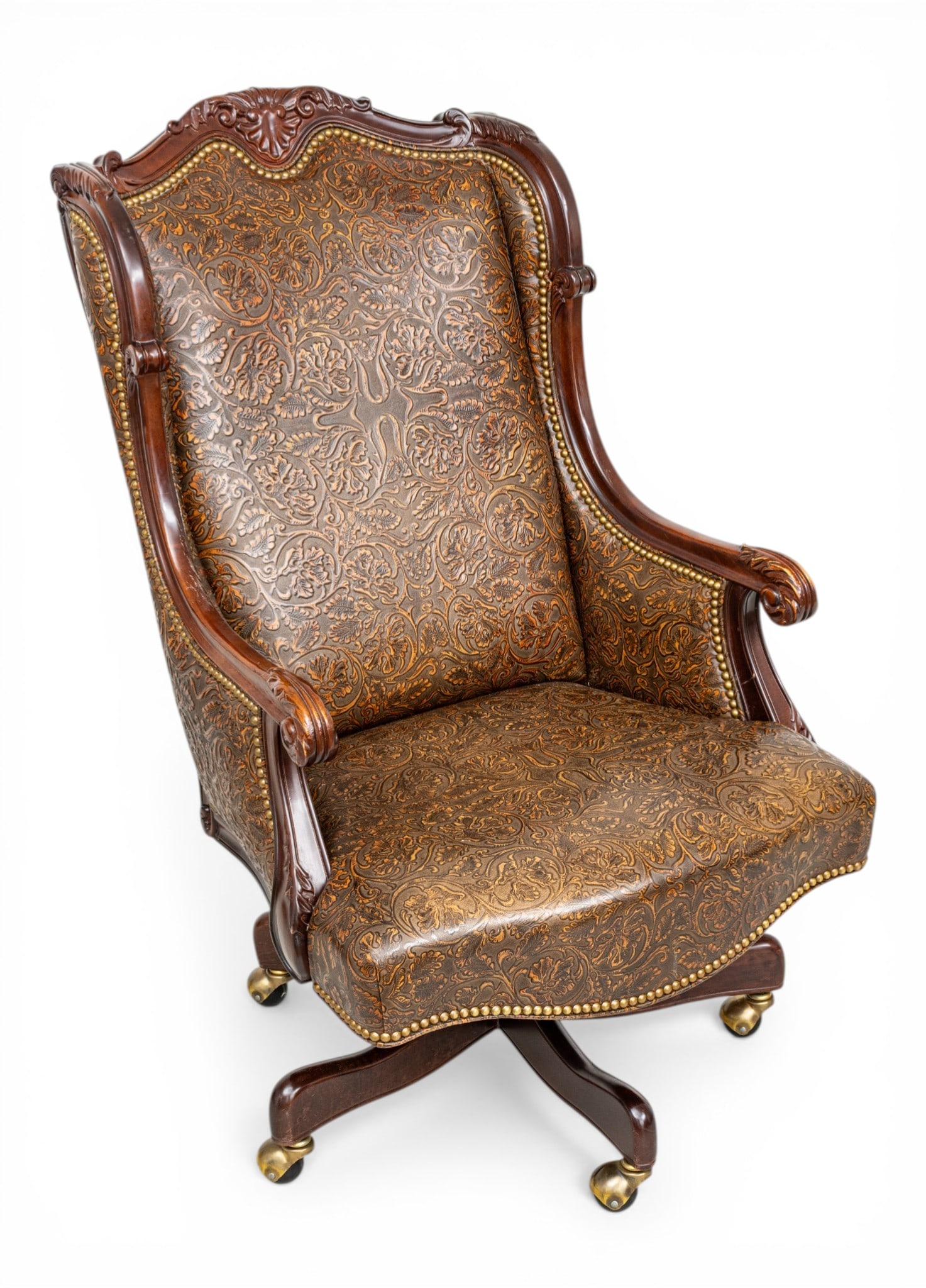 Robb & Stucky Furniture Co. Tooled Leather Executive Office Chair H 45.25" W 27.5" Depth 25": Robb & Stucky Furniture Co. Tooled Leather Executive Office Chair H 45.25" W 27.5" Depth 25" Carved wooden frame with tooled leather upholstered and nail head trim, raised on rolling base. Robb and St