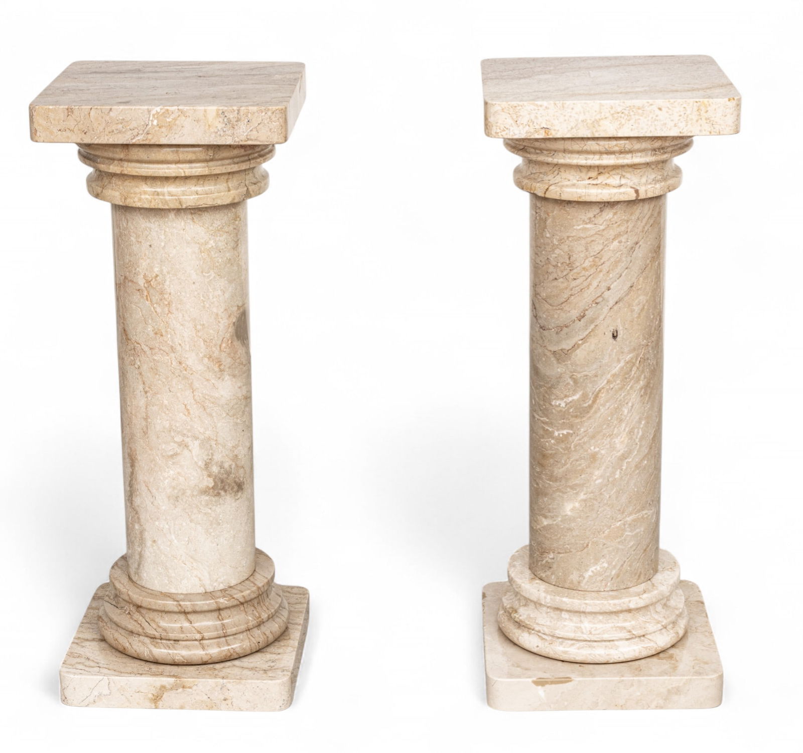 Pair of Italian Doric Columnar Form Beige Marble Pedestals 20th C., H 36'' W 14'' 2 PCS: Pair of Italian Doric Columnar Form Beige Marble Pedestals 20th C., H 36'' W 14'' 2 PCS Each comprised of a tiered platform with square base, cylindrical shaft. Echinus supporting a square a