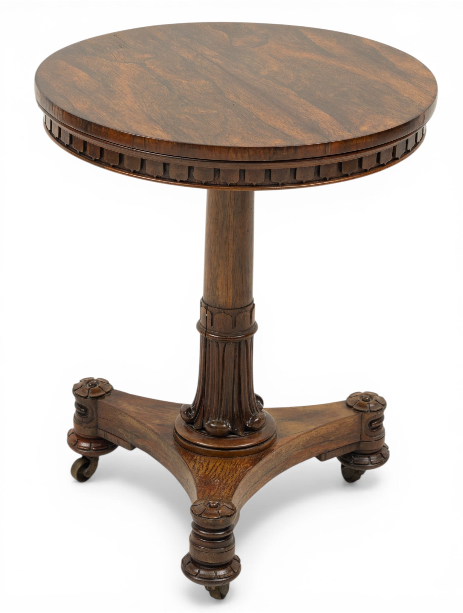 William IV Style Carved Walnut Circular Pedestal Table Late 19th C., H 27" W 22" L 22" 1 PC: William IV Style Carved Walnut Circular Pedestal Table Late 19th C., H 27" W 22" L 22" 1 PC Triform base on bun feet. Carved scalloped apron supporting a round top. Provenance: Property from a