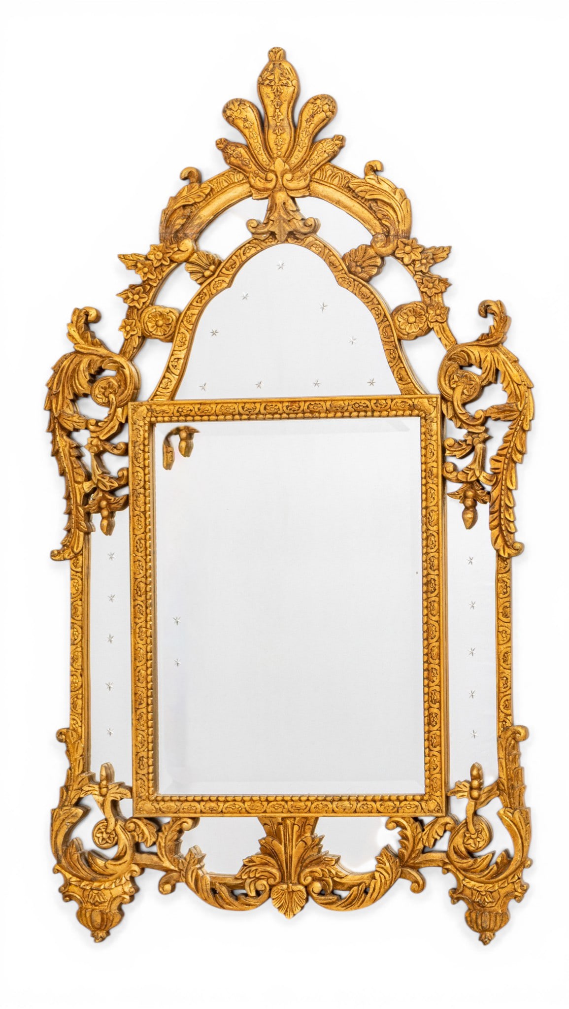 Louis XVI Style Giltwood and Gesso Wall Mirror, 20th C., H 46.5" W 25.75": Louis XVI Style Giltwood and Gesso Wall Mirror, 20th C., H 46.5" W 25.75" Having a central stylized plume over scrolling foliate and leaf decoration. Provenance: Property from Franklin, MI private co