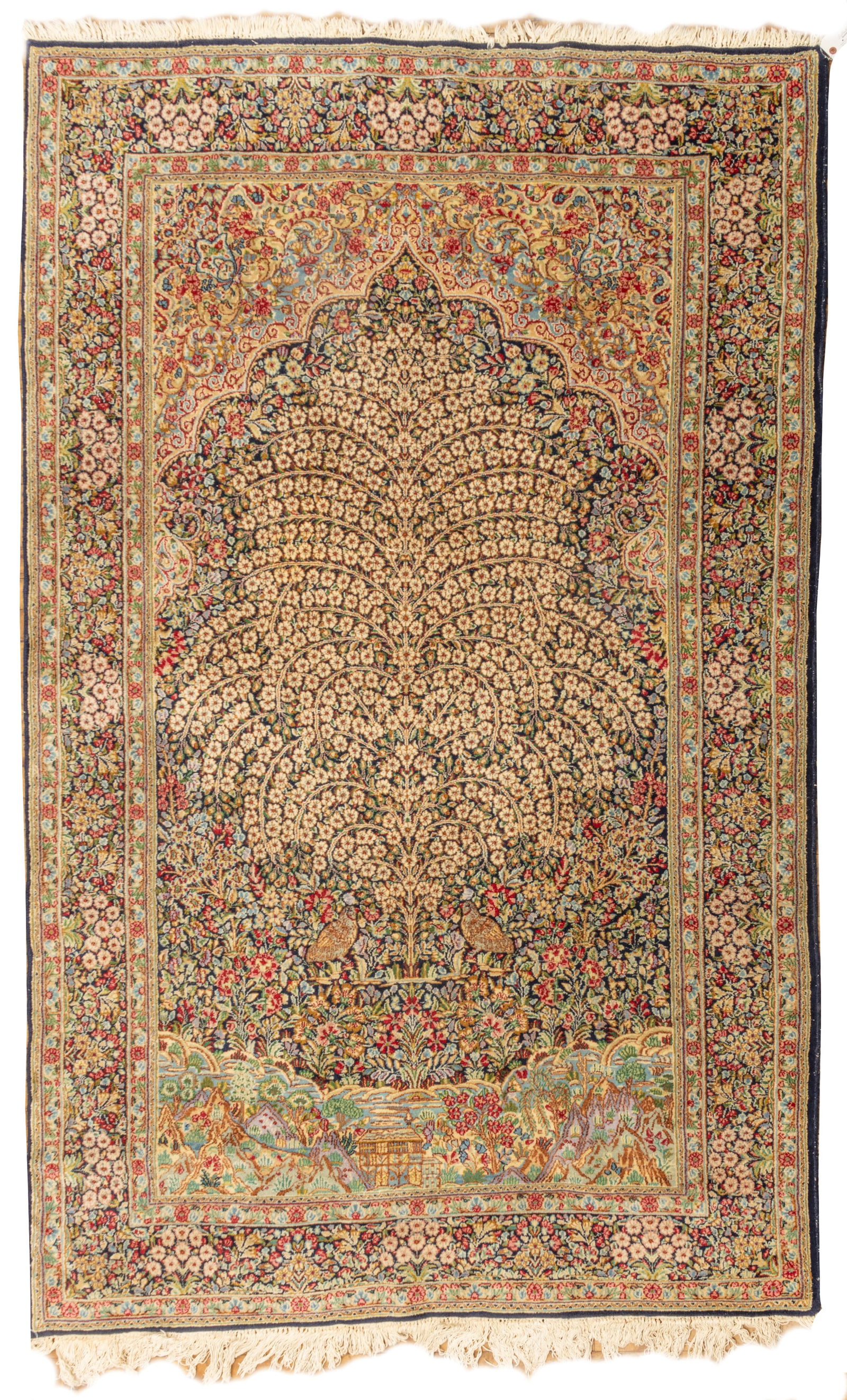 Persian Lavar Kerman Handwoven Wool Rug, Ca. 1910-1920, W 5' L 7' 9": Persian Lavar Kerman Handwoven Wool Rug, Ca. 1910-1920, W 5' L 7' 9" Dense tree of life design above a mountain village. Overall dense floral patterns with quail accents. Provenance: Property f
