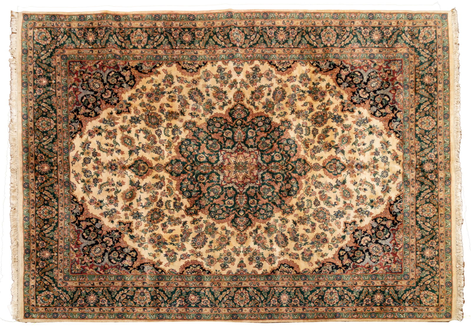 Persian Closed Field Kerman Handwoven Wool Rug, Ca. 1950, W 8' 3" L 10' 2": Persian Closed Field Kerman Handwoven Wool Rug, Ca. 1950, W 8' 3" L 10' 2" Having a central emerald green medallion with bold geometric floral designs. Surrounded by an ivory field with floral sprays