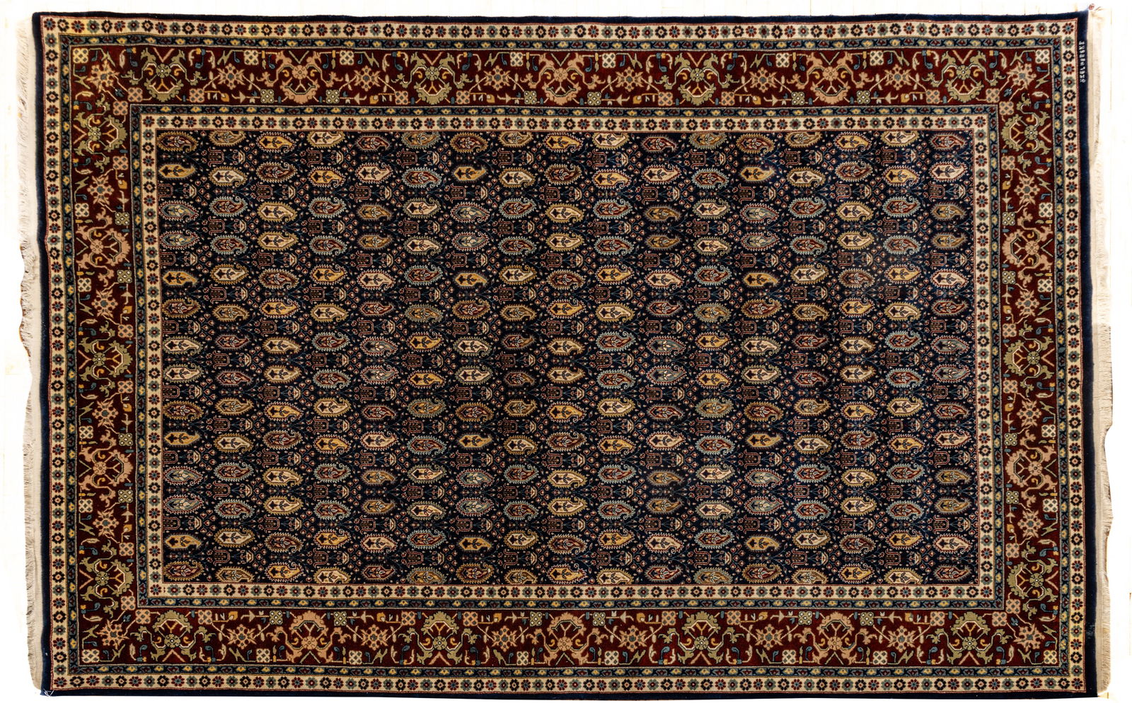 Persian Kashan Handwoven Wool Rug, 1978, W 6' 5" L 9' 6": Persian Kashan Handwoven Wool Rug, 1978, W 6' 5" L 9' 6" Signed Kashan, 1978, in one corner. Bleu de Roi field with repetitious dahlia medallions. Rust colored outer border with scrolling floral and v