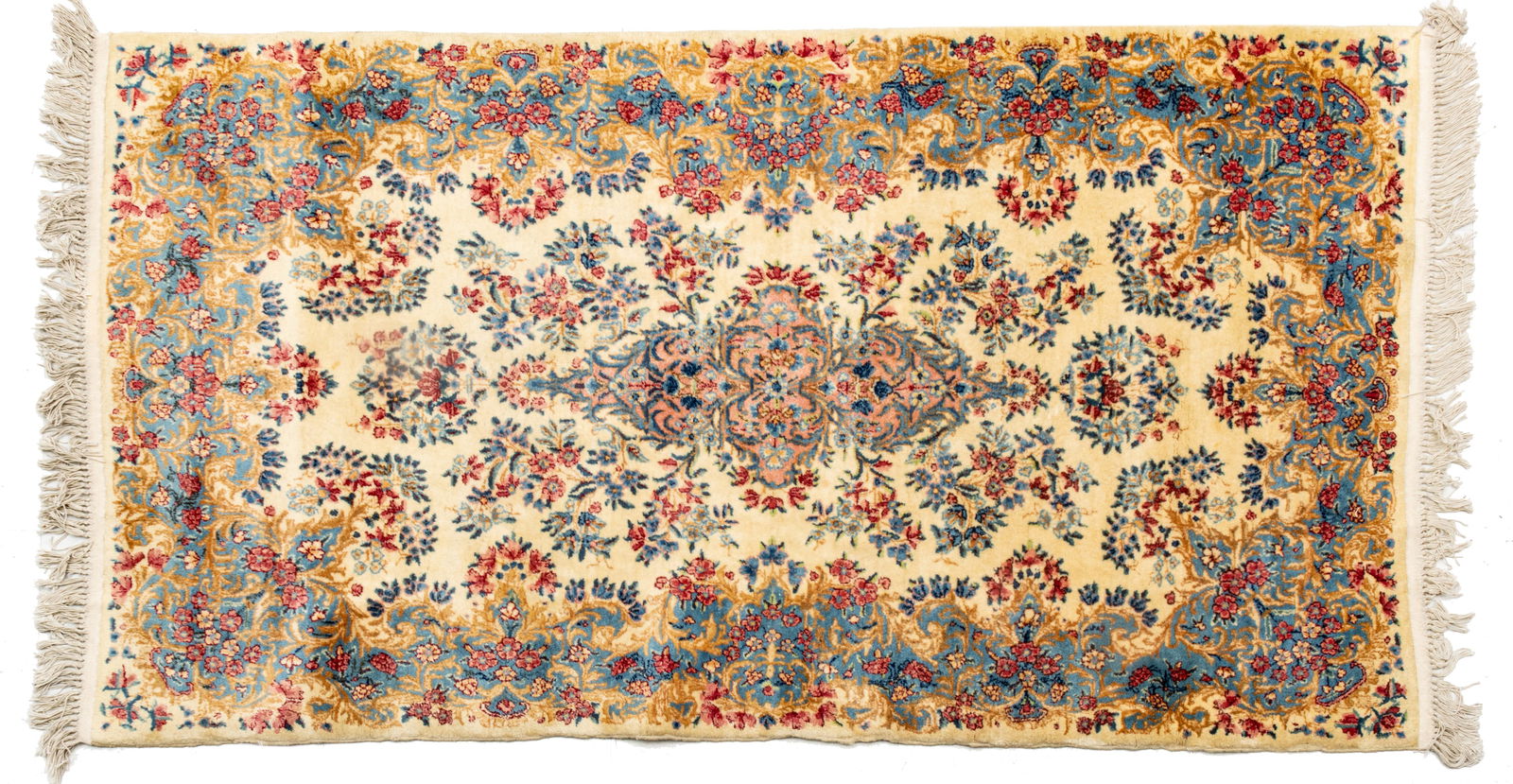 Persian Kerman Handwoven Wool Rug, Ca. 1970, W 3' 9" L 6' 11": Persian Kerman Handwoven Wool Rug, Ca. 1970, W 3' 9" L 6' 11" Ivory field with overall floral designs in light blue, navy, red and pink. Provenance: Property from the collection of Margarat Wee