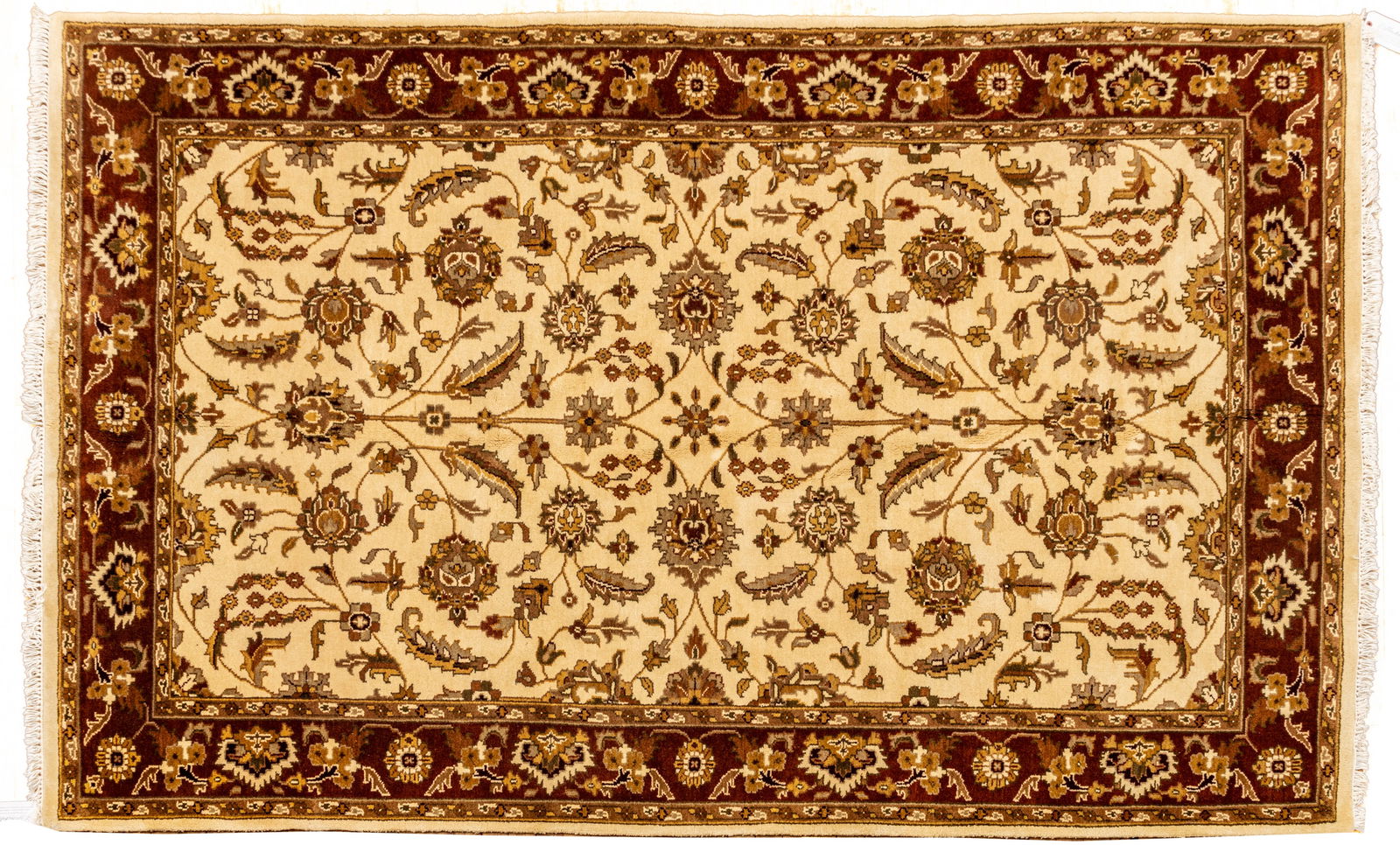 Indo-Tabriz Handwoven Wool Rug, Ca. 1990, W 5' 11" L 9': Indo-Tabriz Handwoven Wool Rug, Ca. 1990, W 5' 11" L 9' Ivory field with scrolling vine and floral designs. Rust outer border. Provenance: Property from the collection of Margarat Weerakoon, Oa