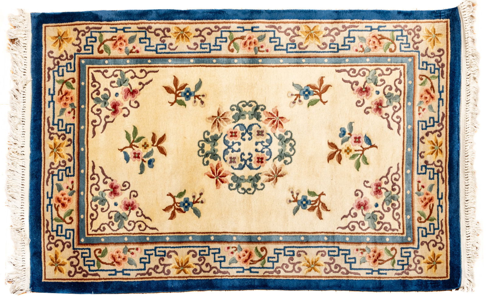 Chinese Art Deco Style Handwoven Wool Rug, Ca. 1980, W 4' L 6': Chinese Art Deco Style Handwoven Wool Rug, Ca. 1980, W 4' L 6' Ivory central field with flower blossom designs. Grey and royal blue border. Provenance: Property from the collection of Margarat Weerak
