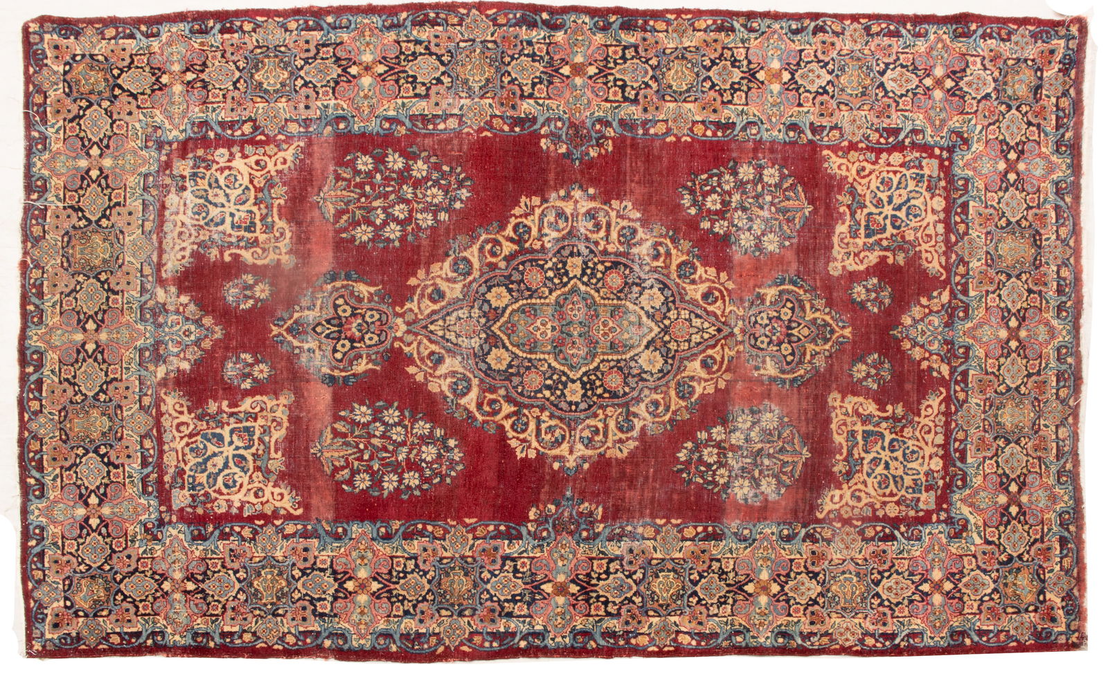 Persian Kerman Handwoven Wool Rug, Ca. 1930, H 7' 3" W 4' 5": Persian Kerman Handwoven Wool Rug, Ca. 1930, H 7' 3" W 4' 5" Oxblood center ground. Closed field having bold floral sprays surrounding geometric medallion. Provenance: Property from the collection of