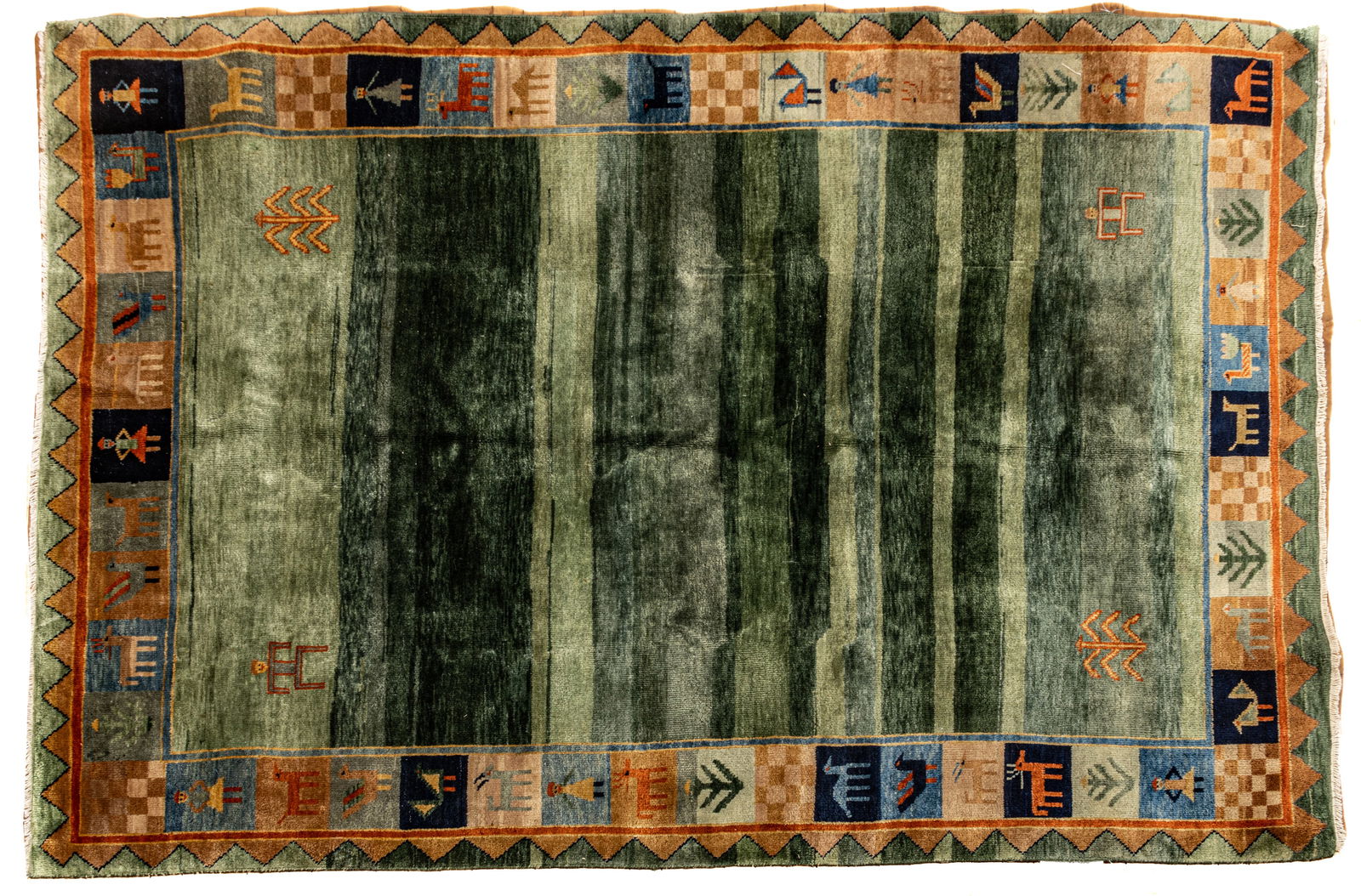 Turkish Gabbeh Style Handwoven Wool Rug, Ca. 2000, W 5' 10" L 7' 11": Turkish Gabbeh Style Handwoven Wool Rug, Ca. 2000, W 5' 10" L 7' 11" Green central field with border design of people, plans, chickens and wild life. Provenance: Property from the collection of Marga
