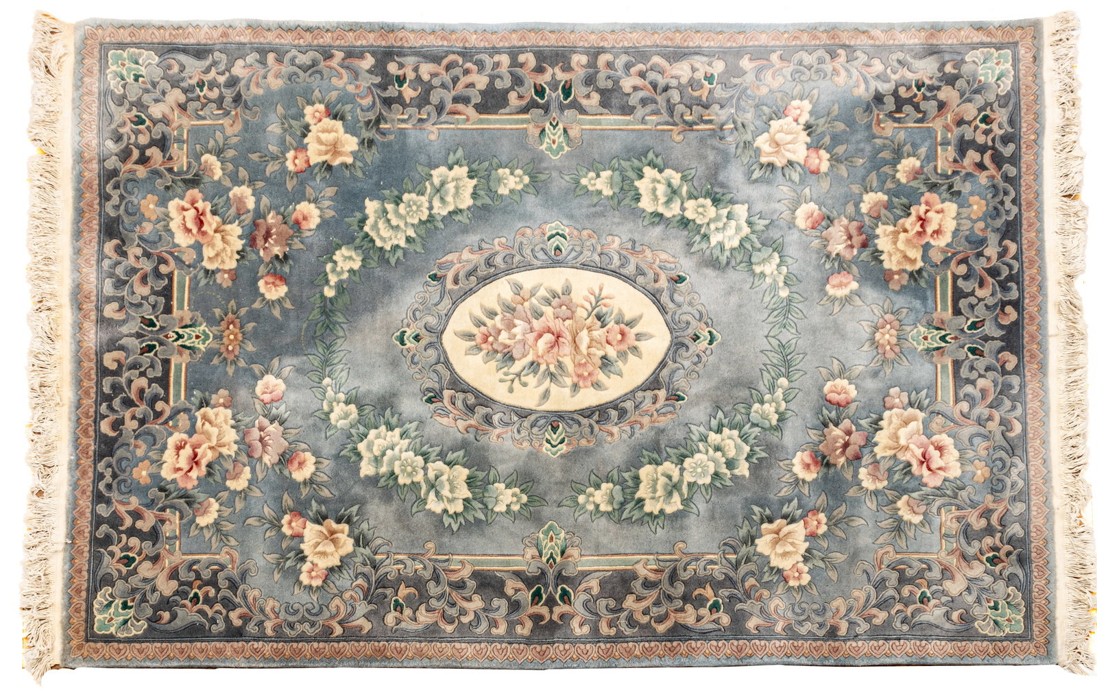 Chinese Hand Woven and Sculpted Wool Rug, Ca. 1980, W 5' 6" L 7' 11": Chinese Hand Woven and Sculpted Wool Rug, Ca. 1980, W 5' 6" L 7' 11" Pastel blue field with ivory central medallion and all over sculpted floral motif. Provenance: Property from the collection of Mar