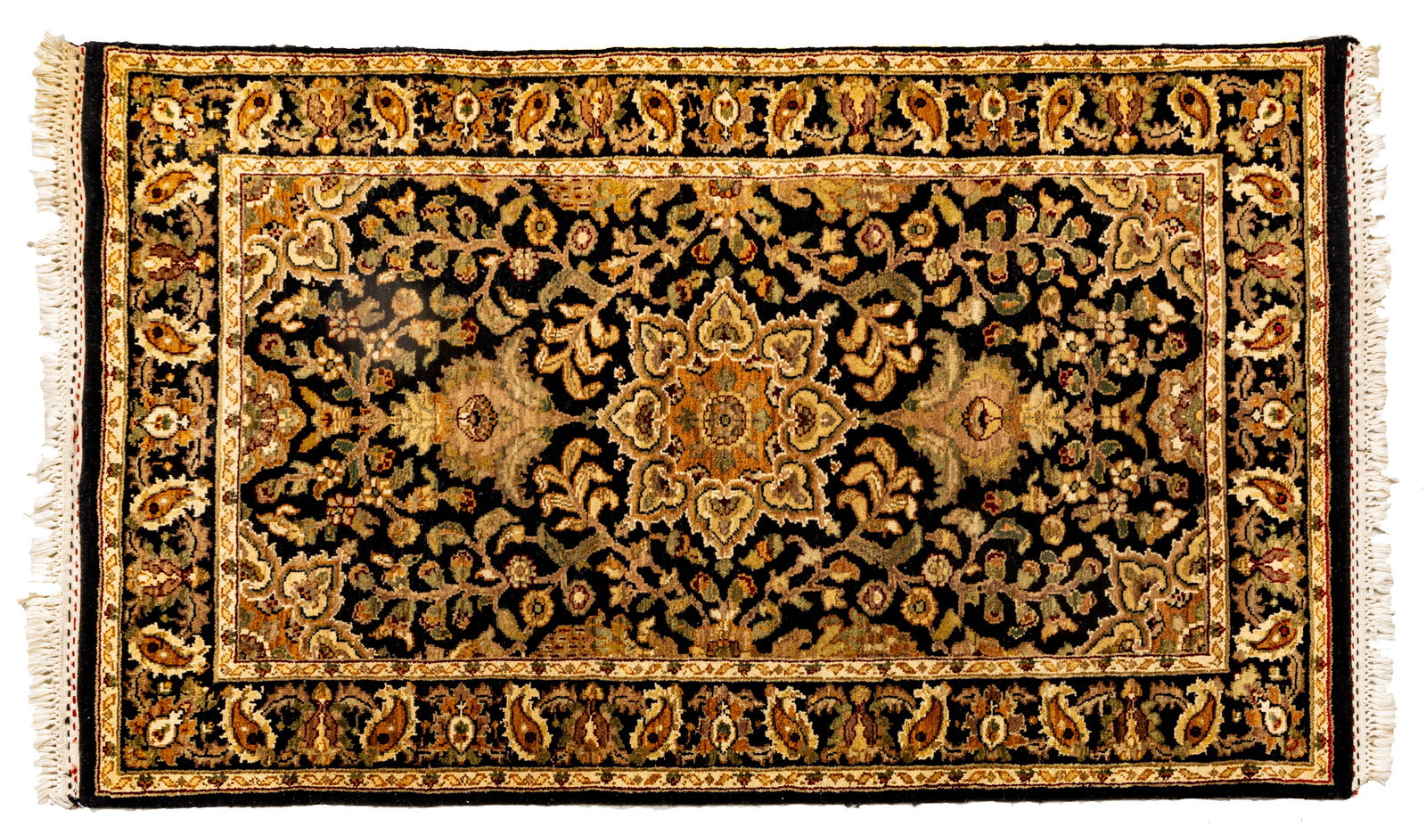 Indo-Tabriz Handwoven Wool Rug, Ca. 1980, W 3' L 5': Indo-Tabriz Handwoven Wool Rug, Ca. 1980, W 3' L 5' Having a black field with a central floral medallion and overall scrolling designs. Provenance: Property from the collection of Margarat Weer