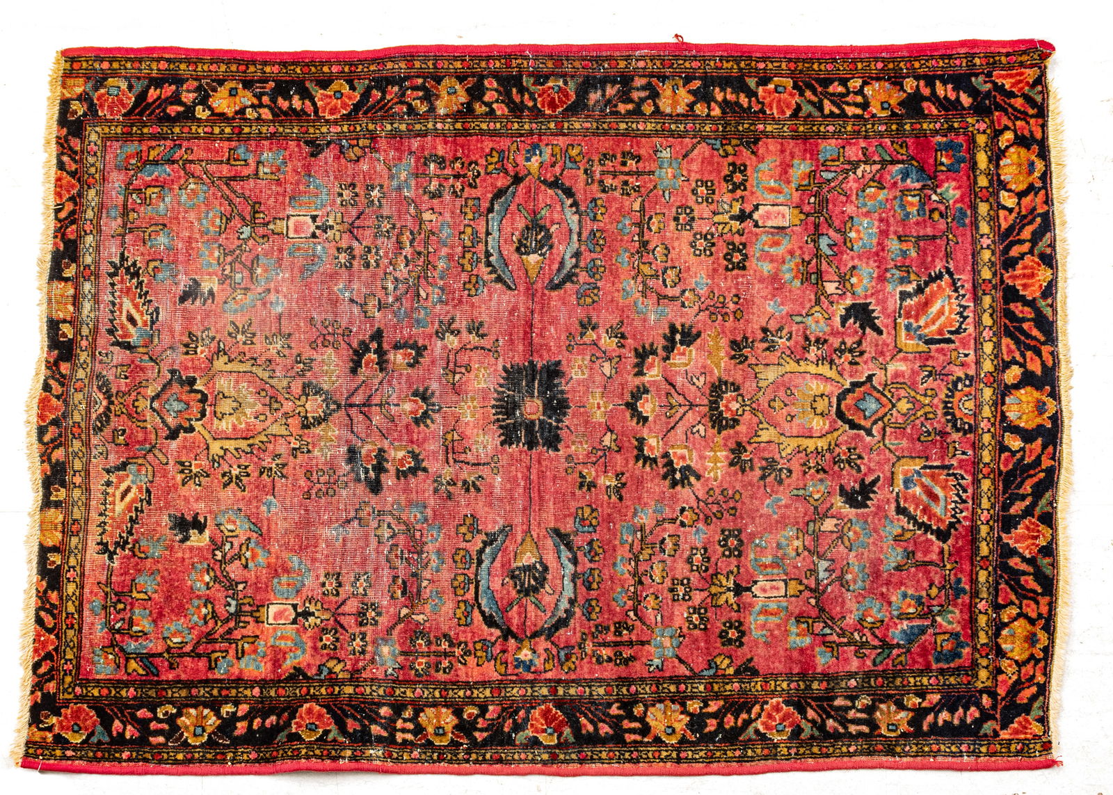 Persian Sarouk Handwoven Wool Rug, Ca. 1920, W 3' 3" L 4' 5": Persian Sarouk Handwoven Wool Rug, Ca. 1920, W 3' 3" L 4' 5" Red painted central field with scrolling floral designs. Provenance: Property from the collection of Margarat Weerakoon, Oak Park, M